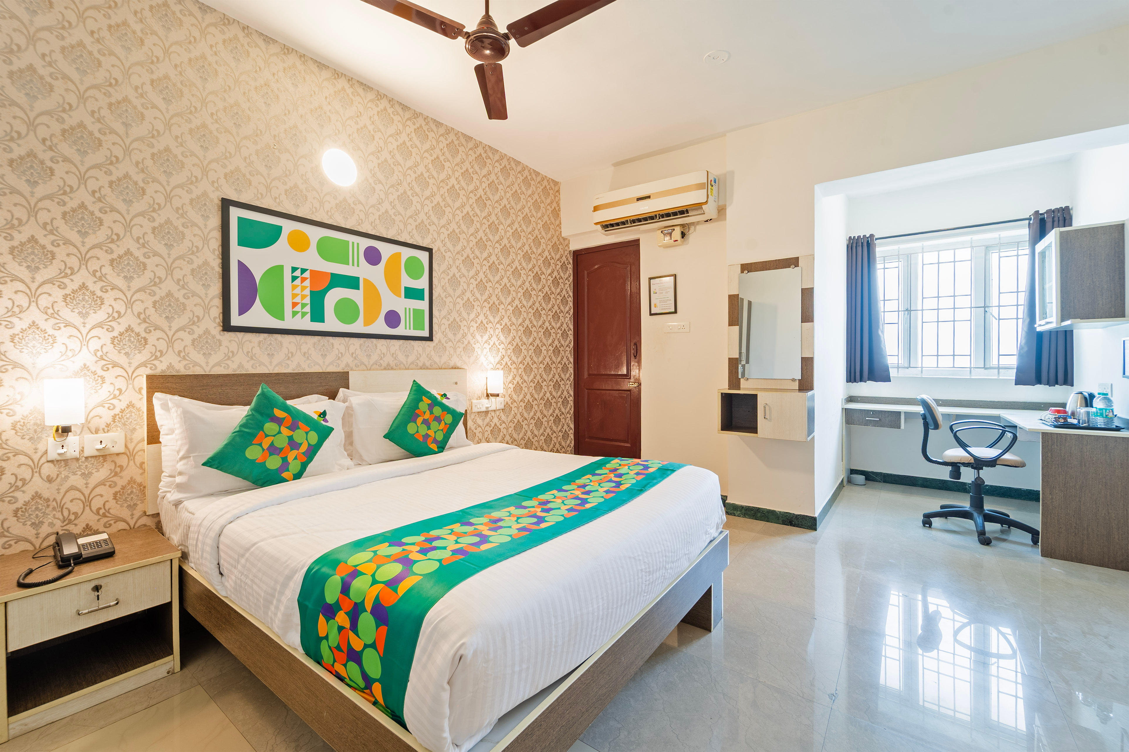 Deluxe room in Treebo AVM Comfort Inn Near Gandhipuram Bus Stand in undefined. 
