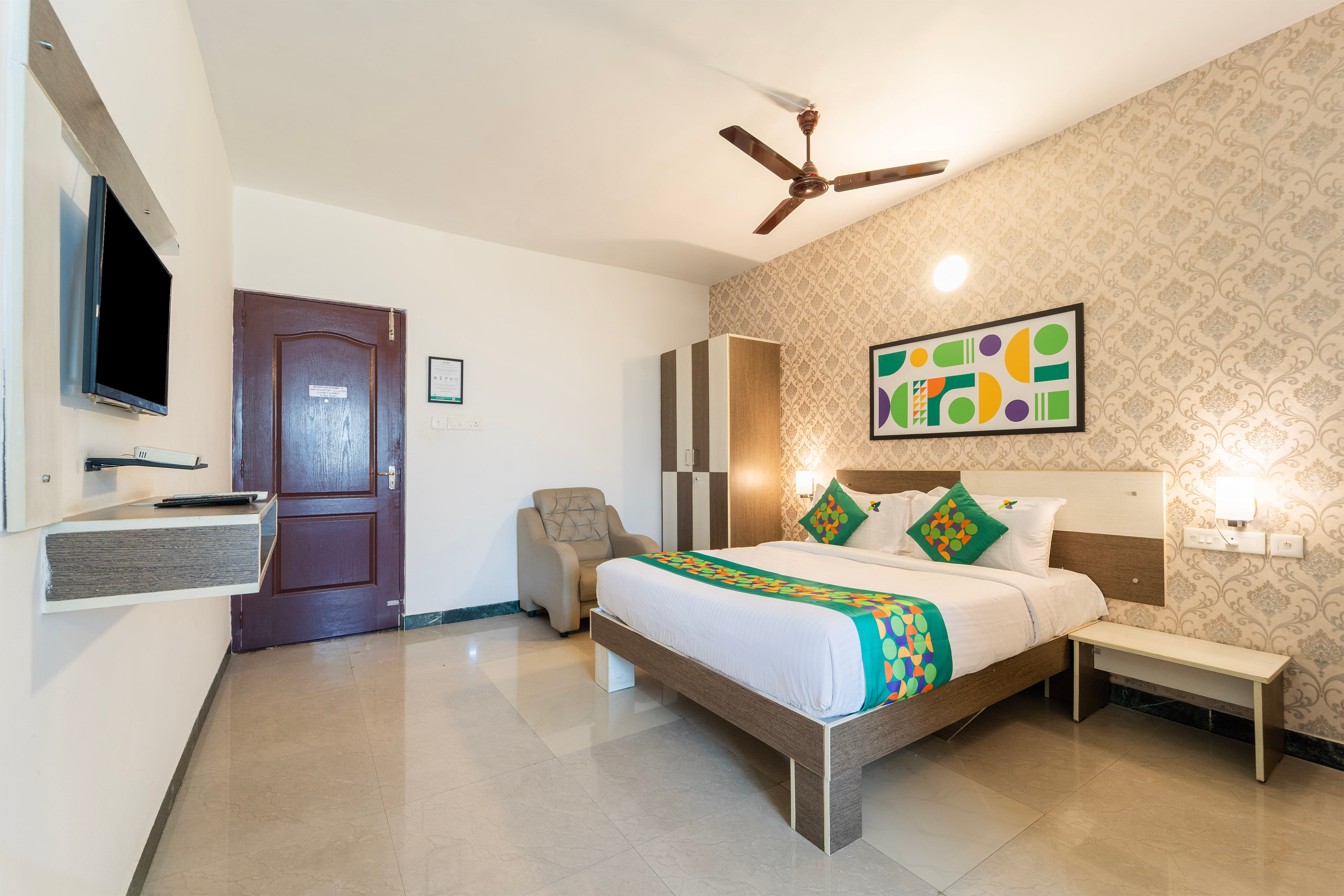 Deluxe room in Treebo AVM Comfort Inn Near Gandhipuram Bus Stand in undefined. 