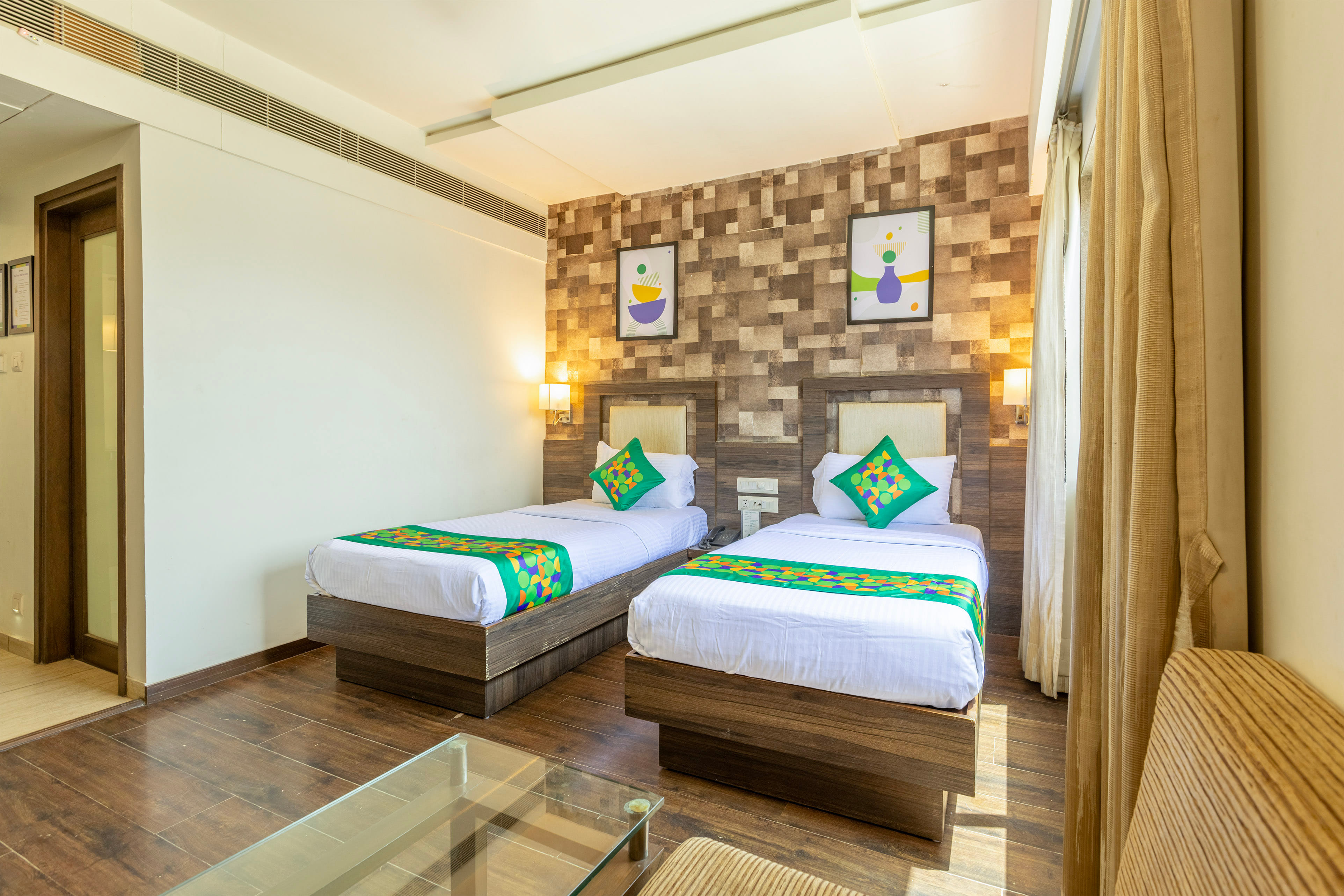 Deluxe room in Treebo Aaram Orchard in undefined. 