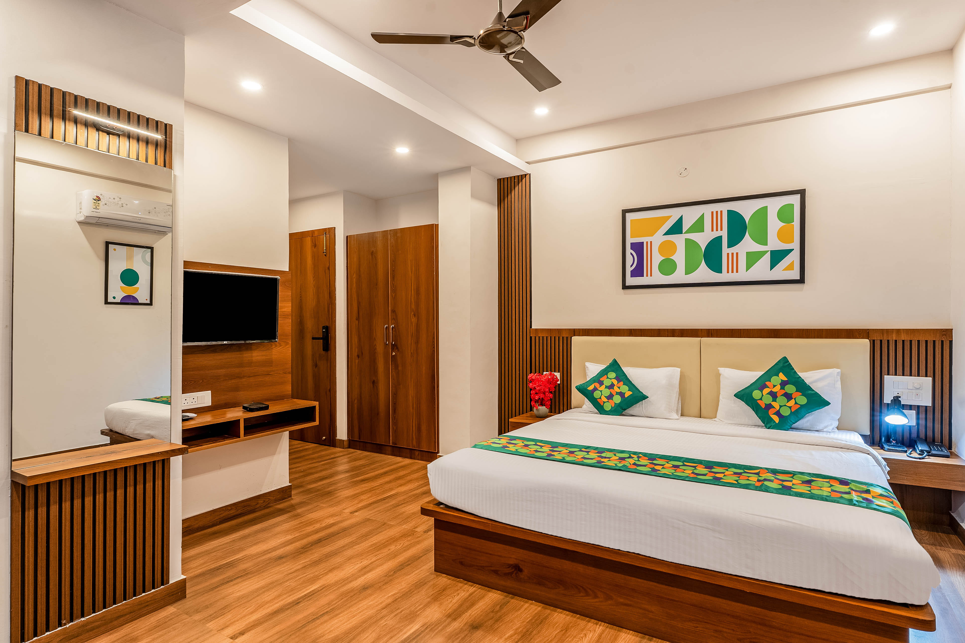 Deluxe room in Treebo Adithi Comforts Inn and Suites in undefined. 