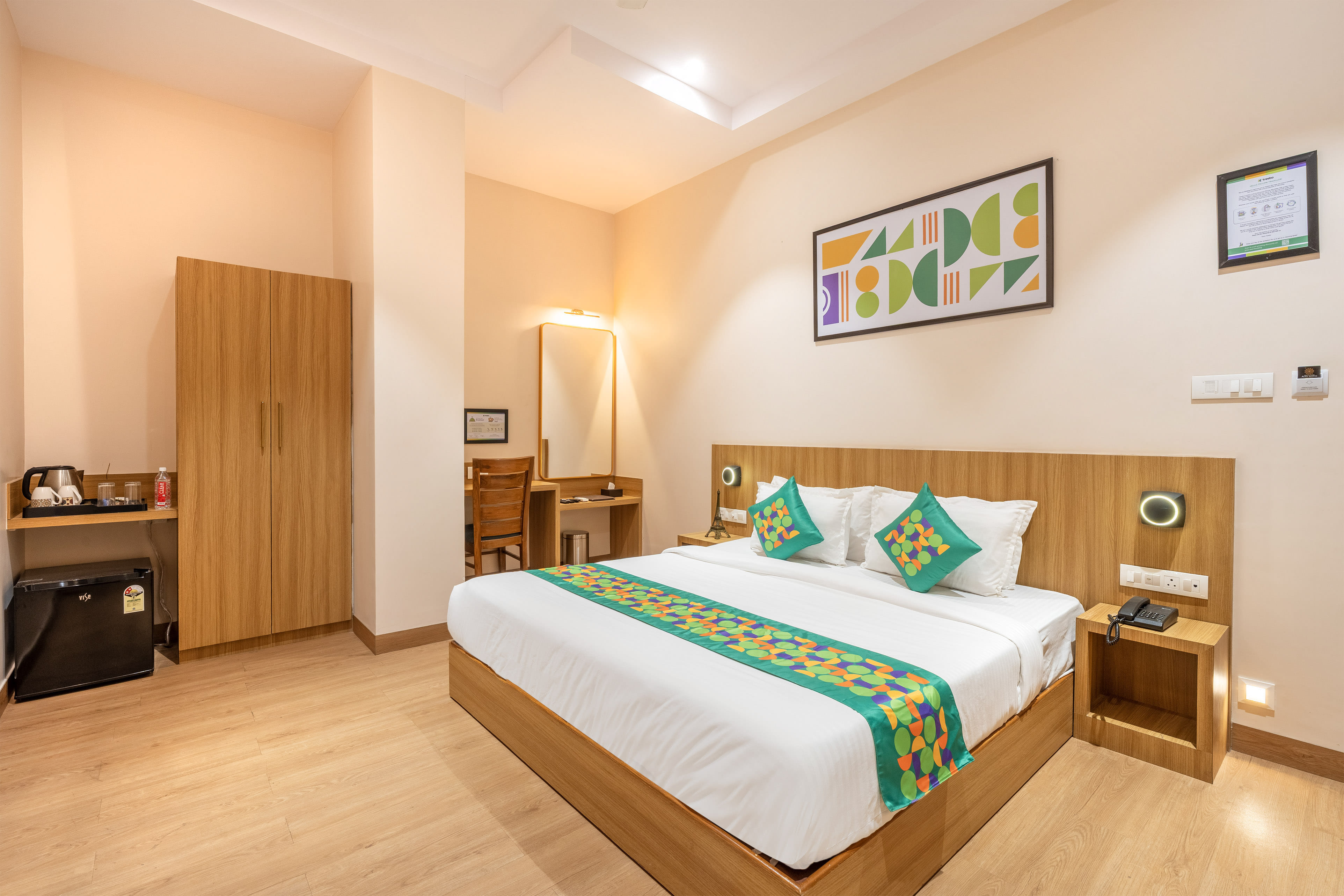 Deluxe room in Treebo Alfa Suites in undefined. 