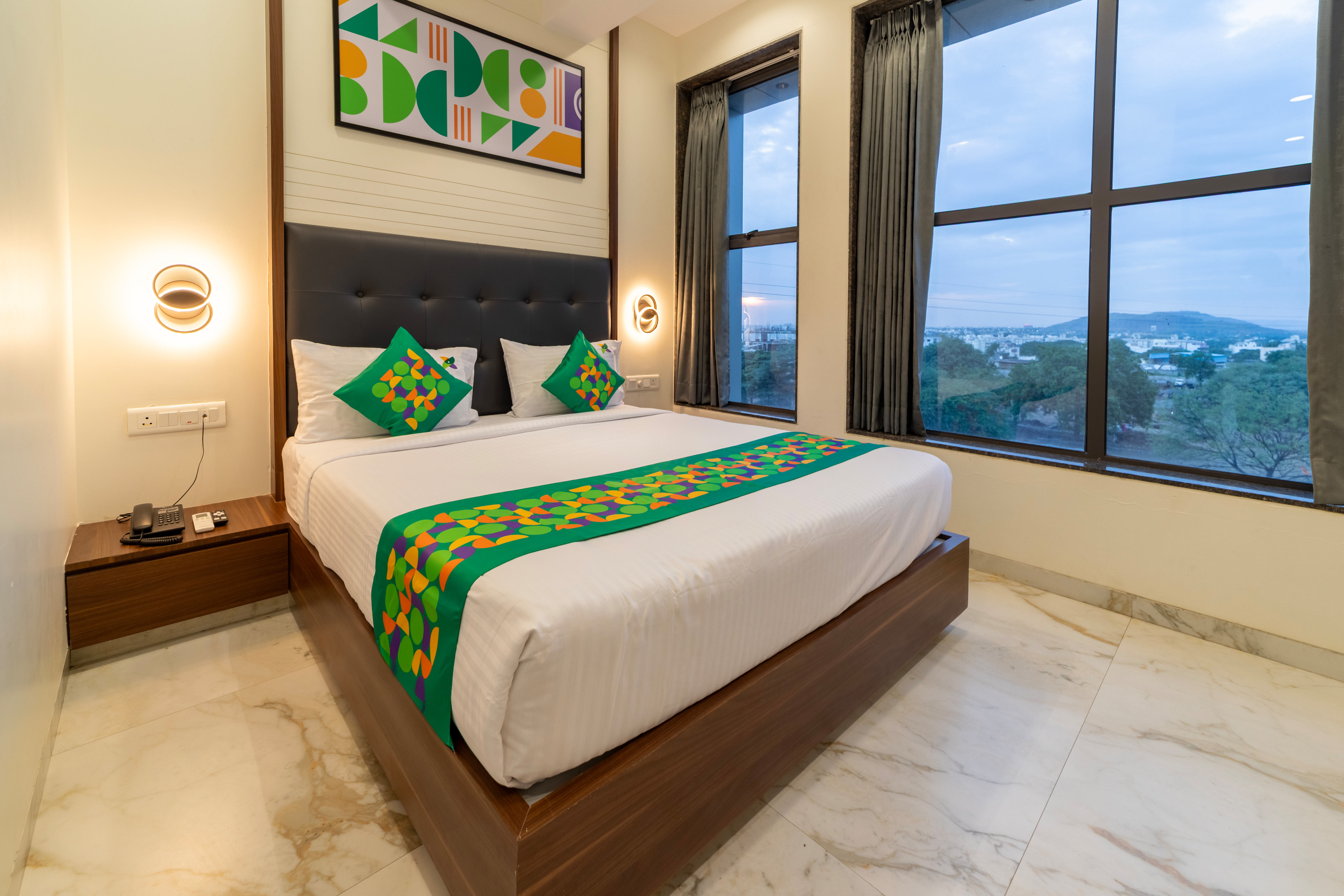 Deluxe room in Treebo Antariksh in undefined.