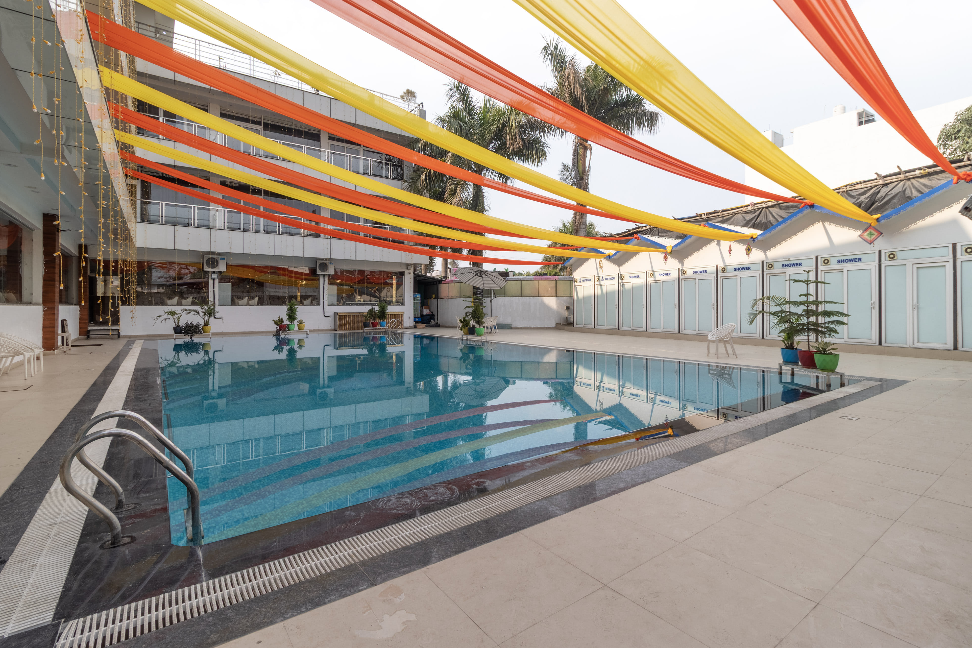 The Pool of Treebo Arya Palace with swimming pool in undefined. 