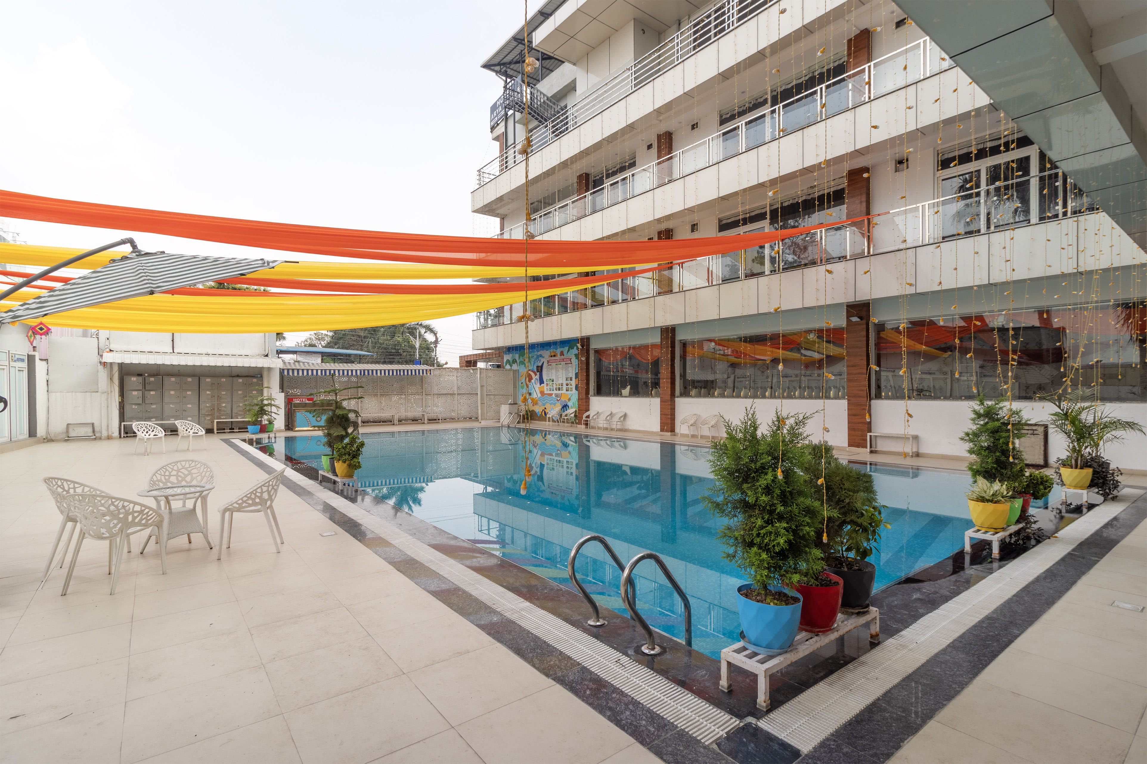 The Pool of Treebo Arya Palace with swimming pool in undefined. 