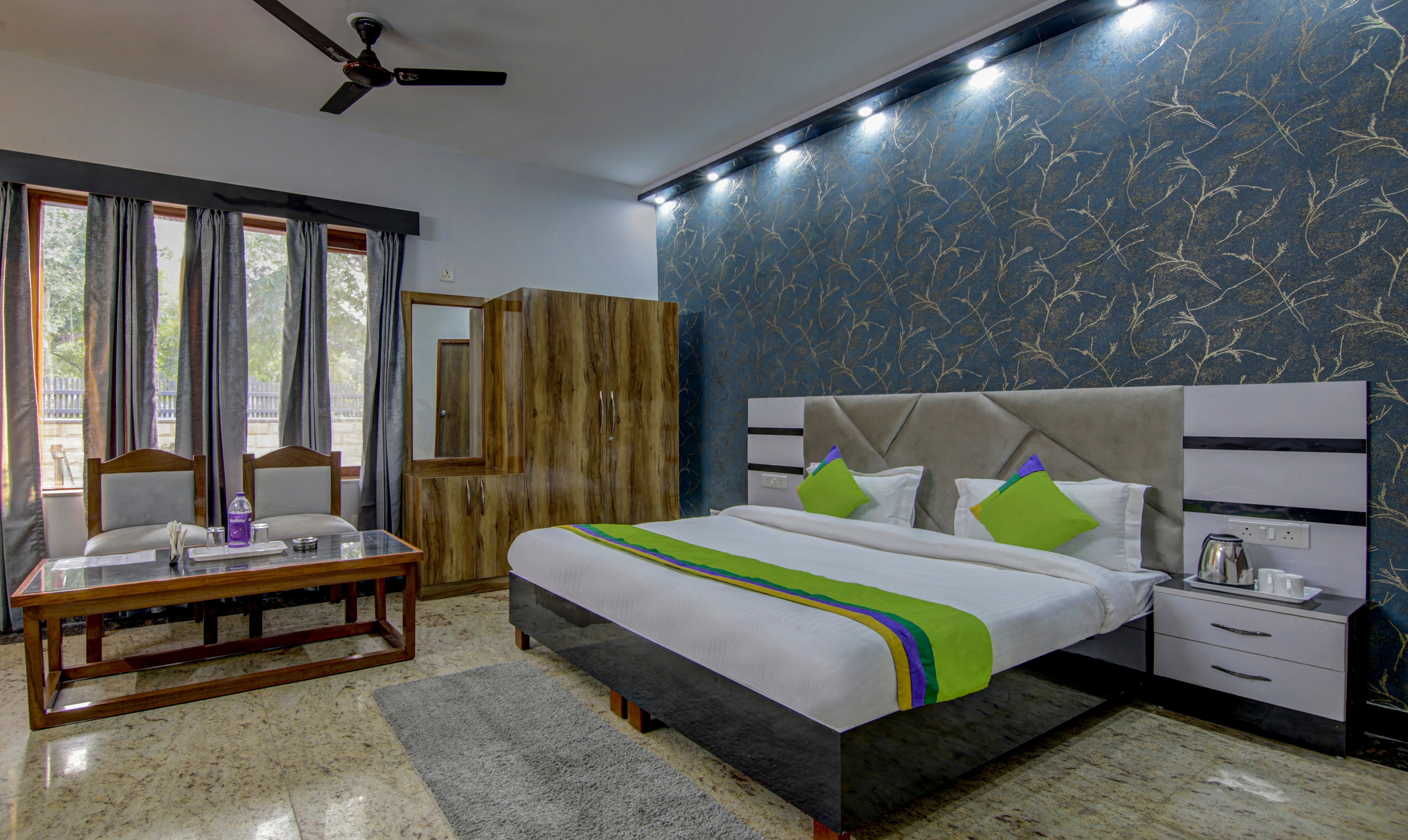 Deluxe room in Treebo Avenzo in undefined. 