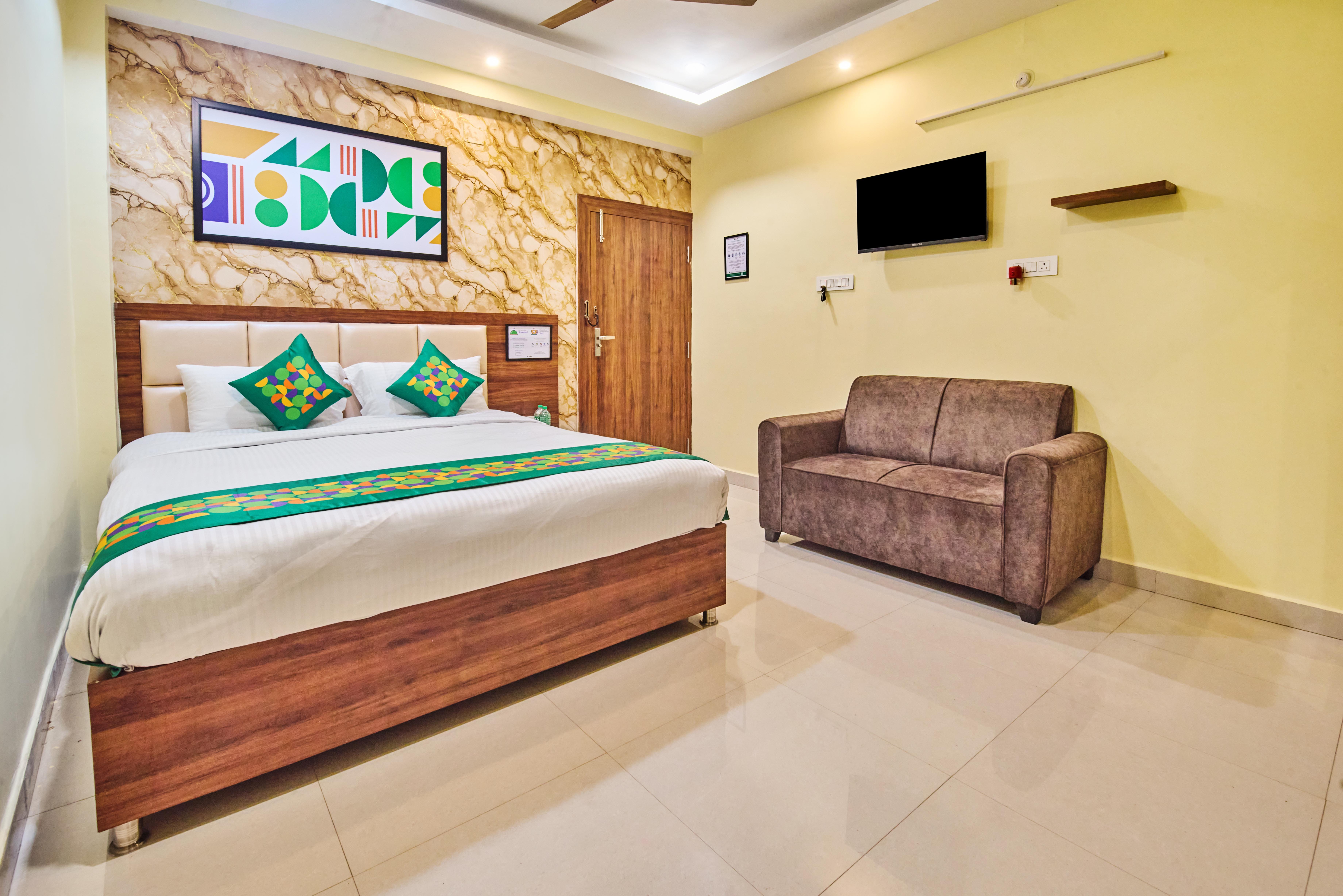 Deluxe room in Treebo Babu Shivaansh Residency in undefined. 