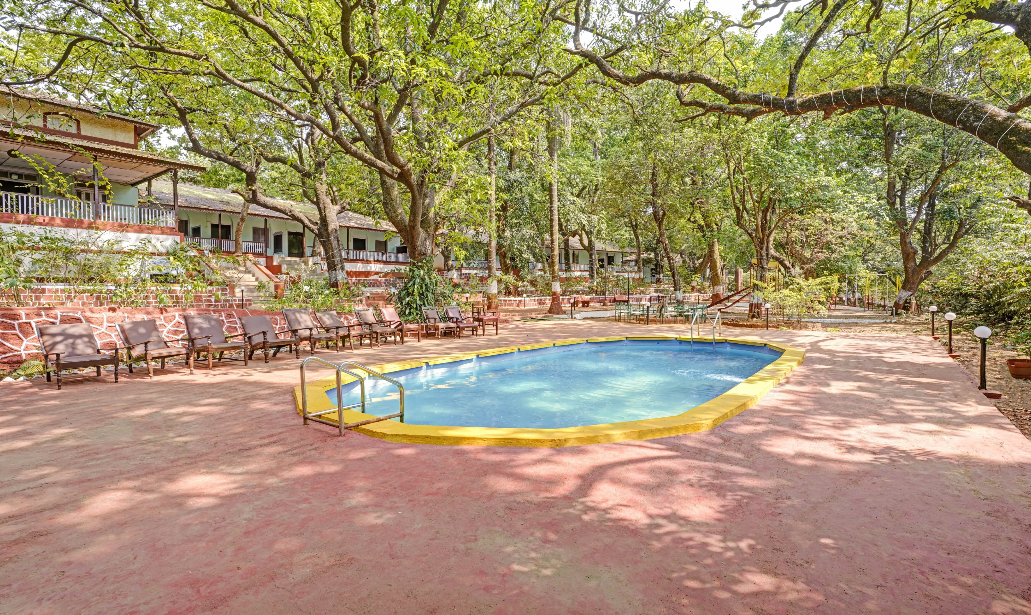 The Pool of Treebo Cecil Resort Matheran With Swimming Pool in undefined. 