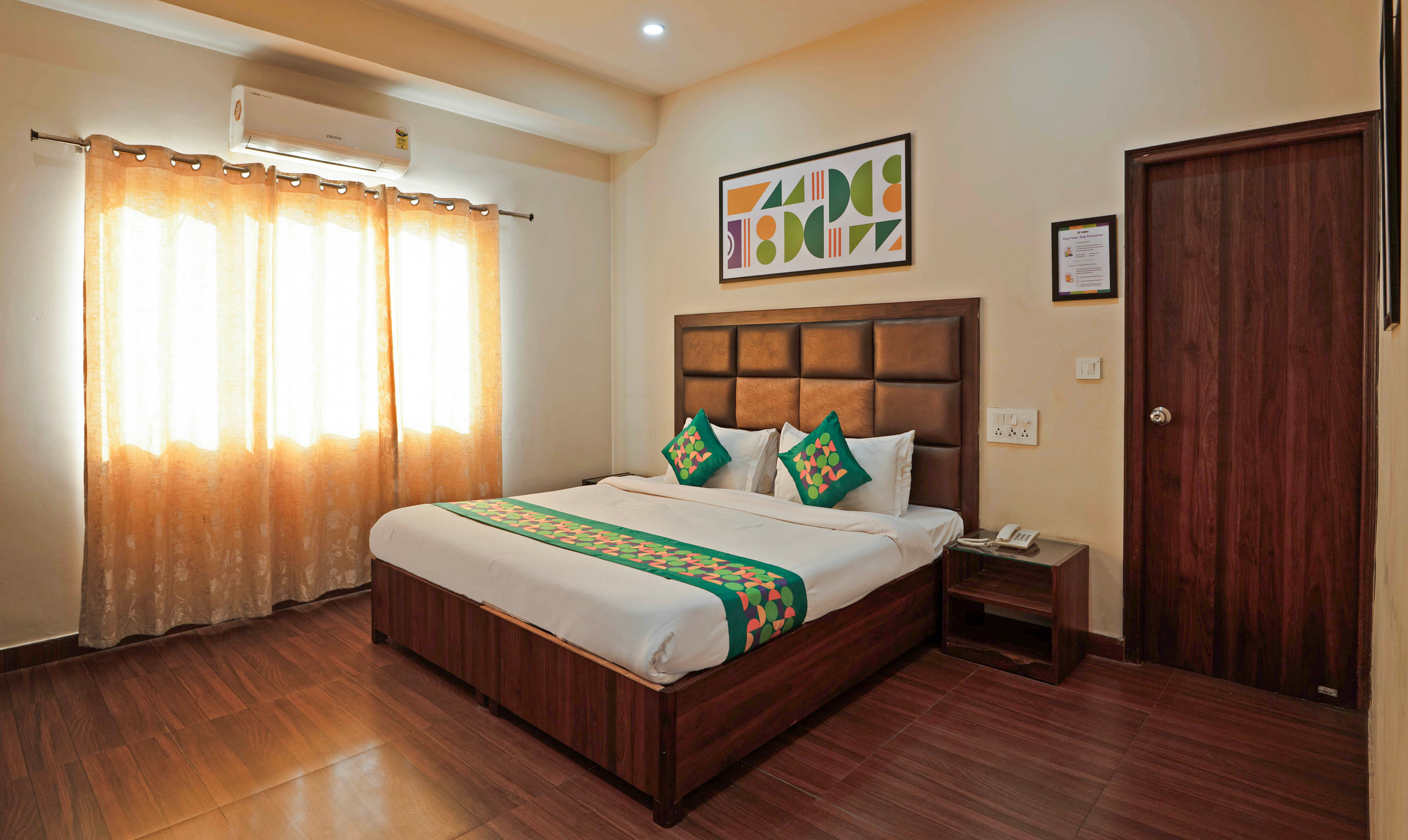 Standard room in Treebo Golden Leaf DDN in undefined. 