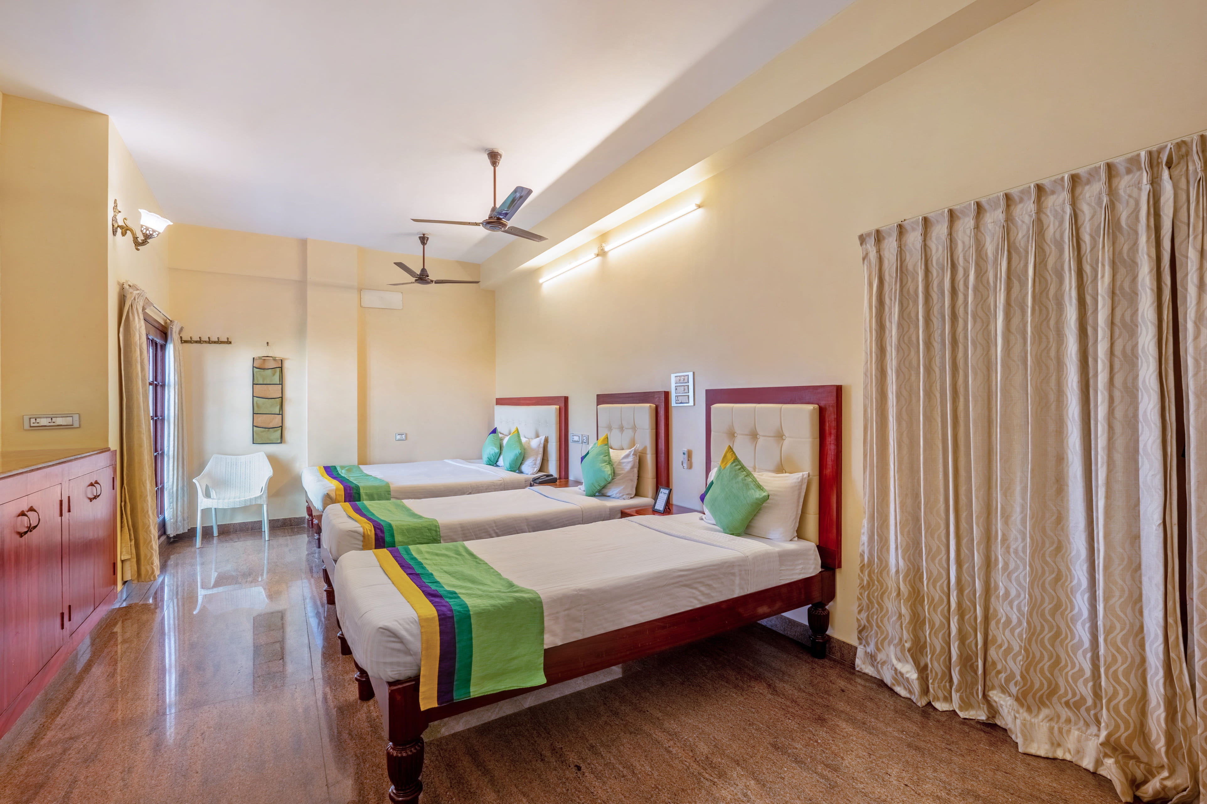 Premium room in Treebo Grace Inn, 3 Min Walk From Promenade Beach in undefined. 
