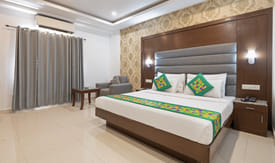 Treebo Grand Legacy Elite With Roof Top Cafe