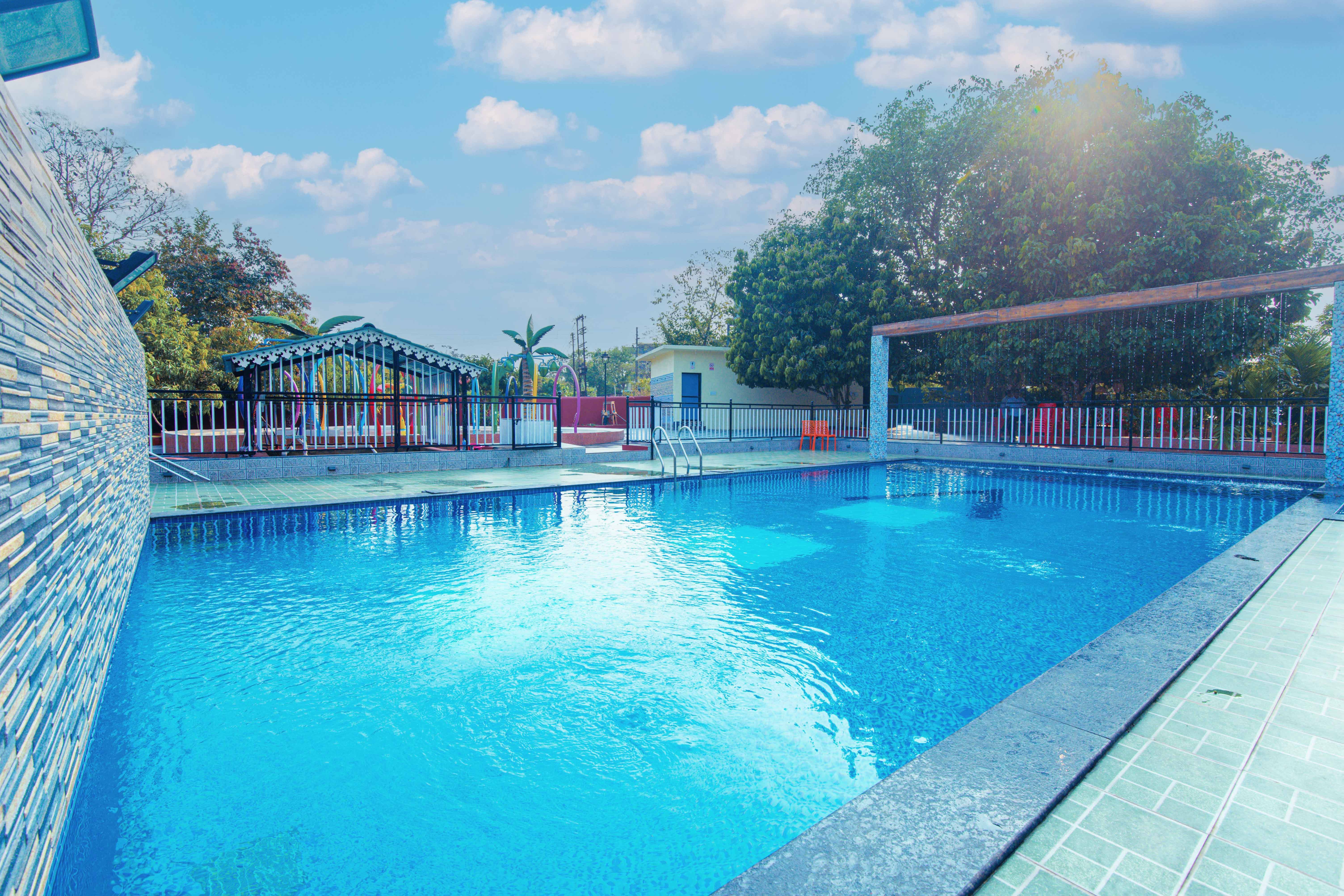 The Pool of Treebo Green Village Resort with Pool in undefined. 