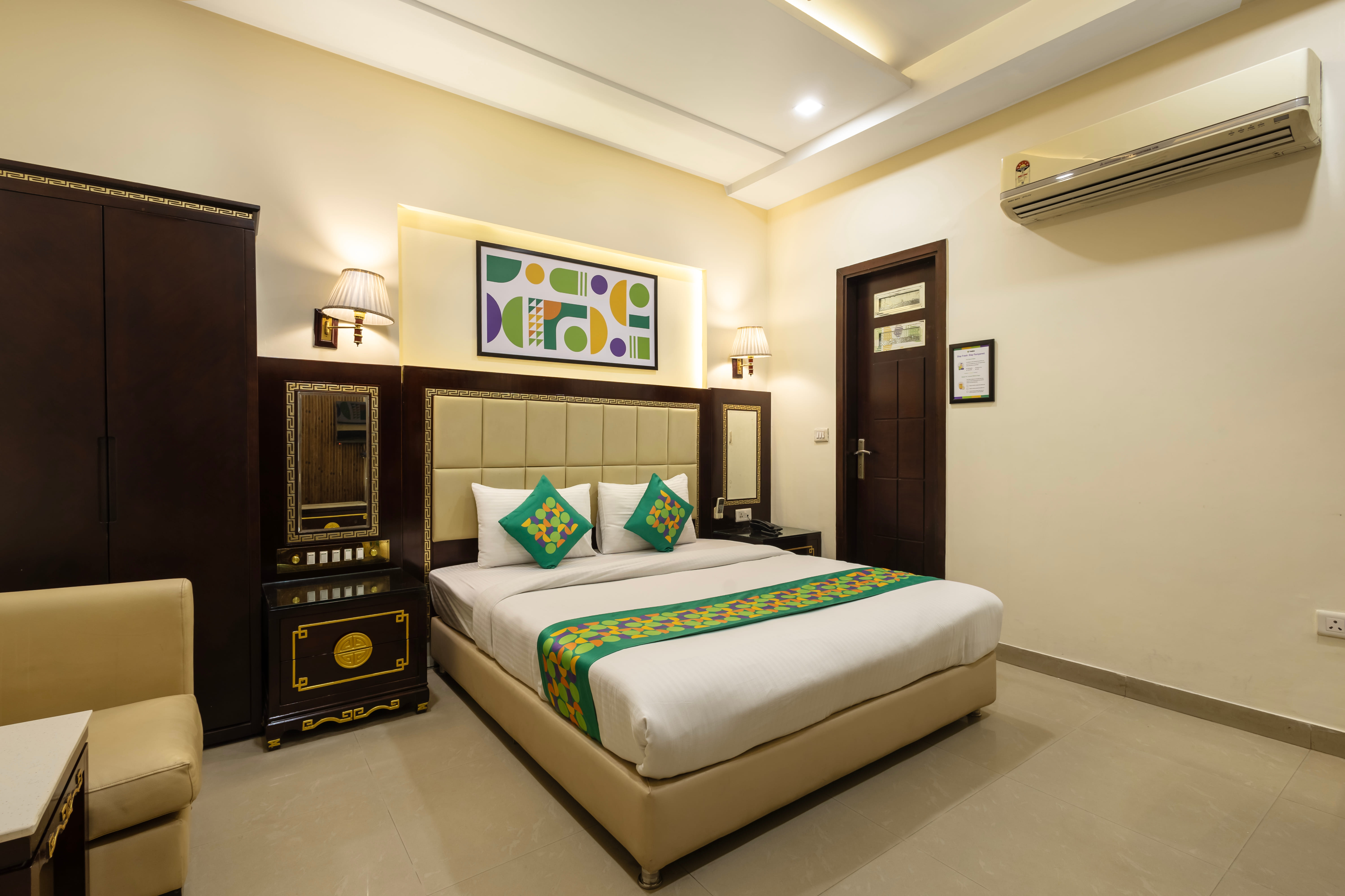 Deluxe room in Treebo Intercity in undefined.