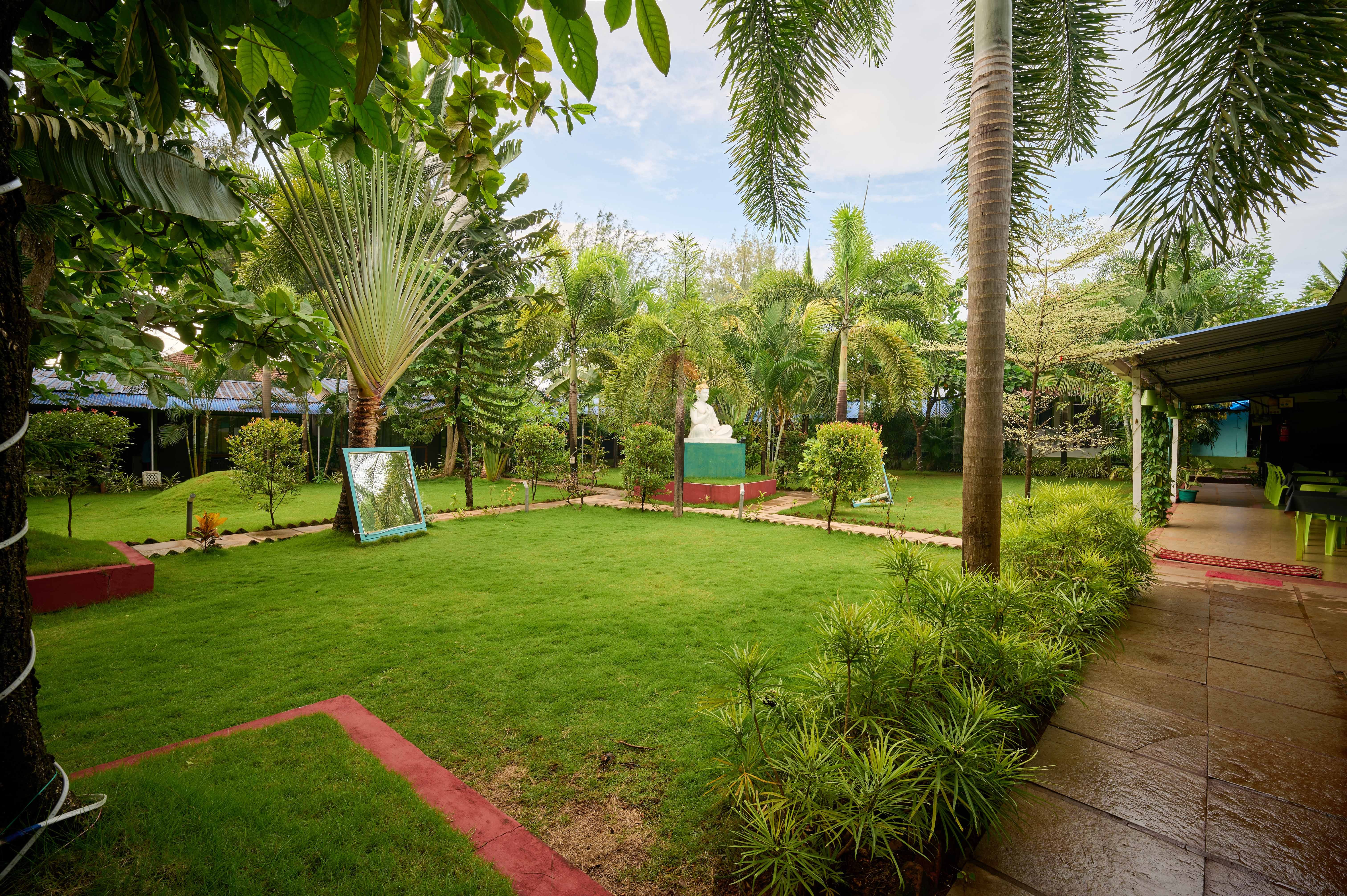The Garden/Outdoors of Treebo Lands End Beach Resort - 100m From Morjim Beach in undefined. 