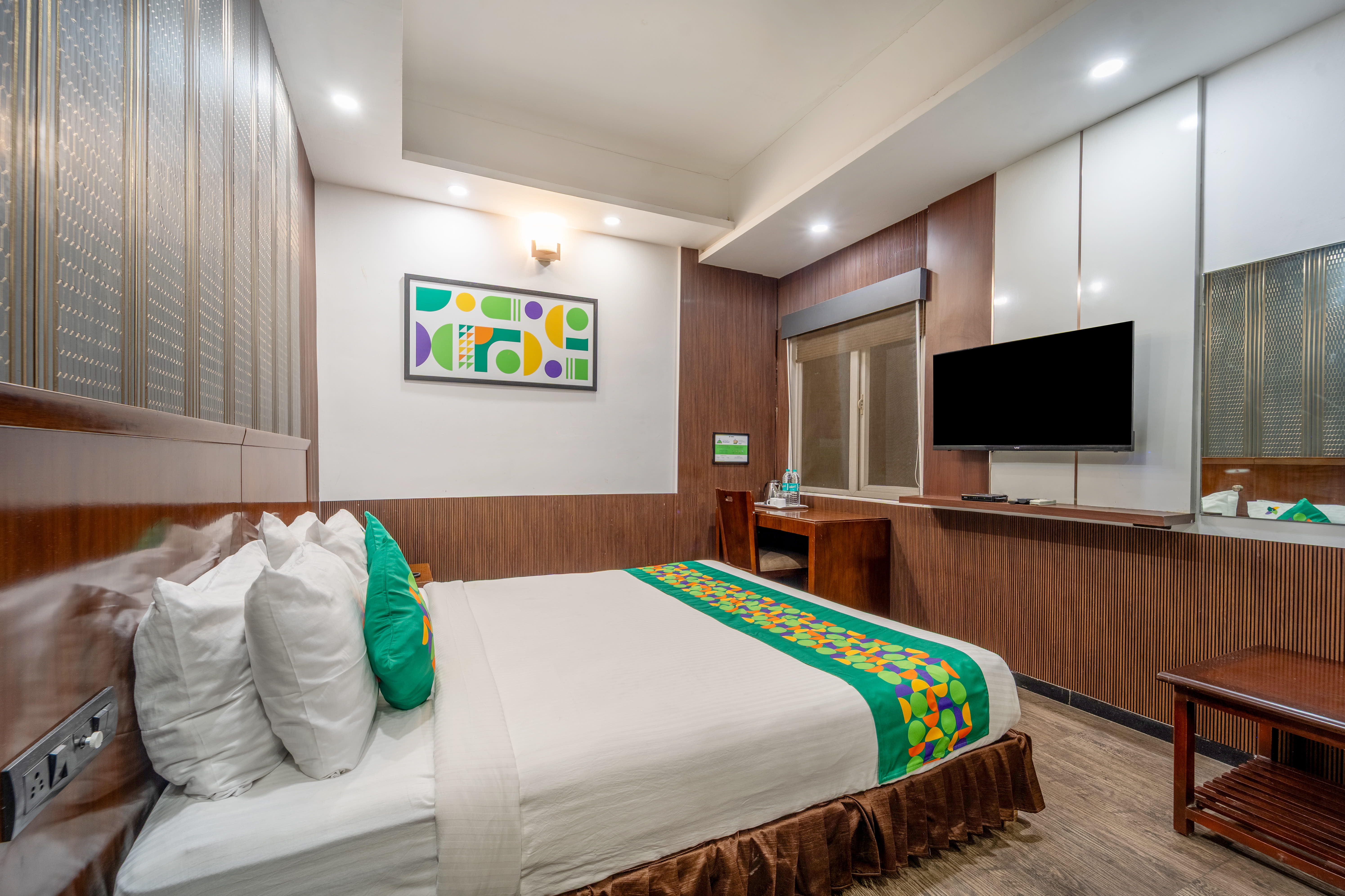 Deluxe room in Treebo Le Pebble Near Tiruppur Railway Station in undefined.