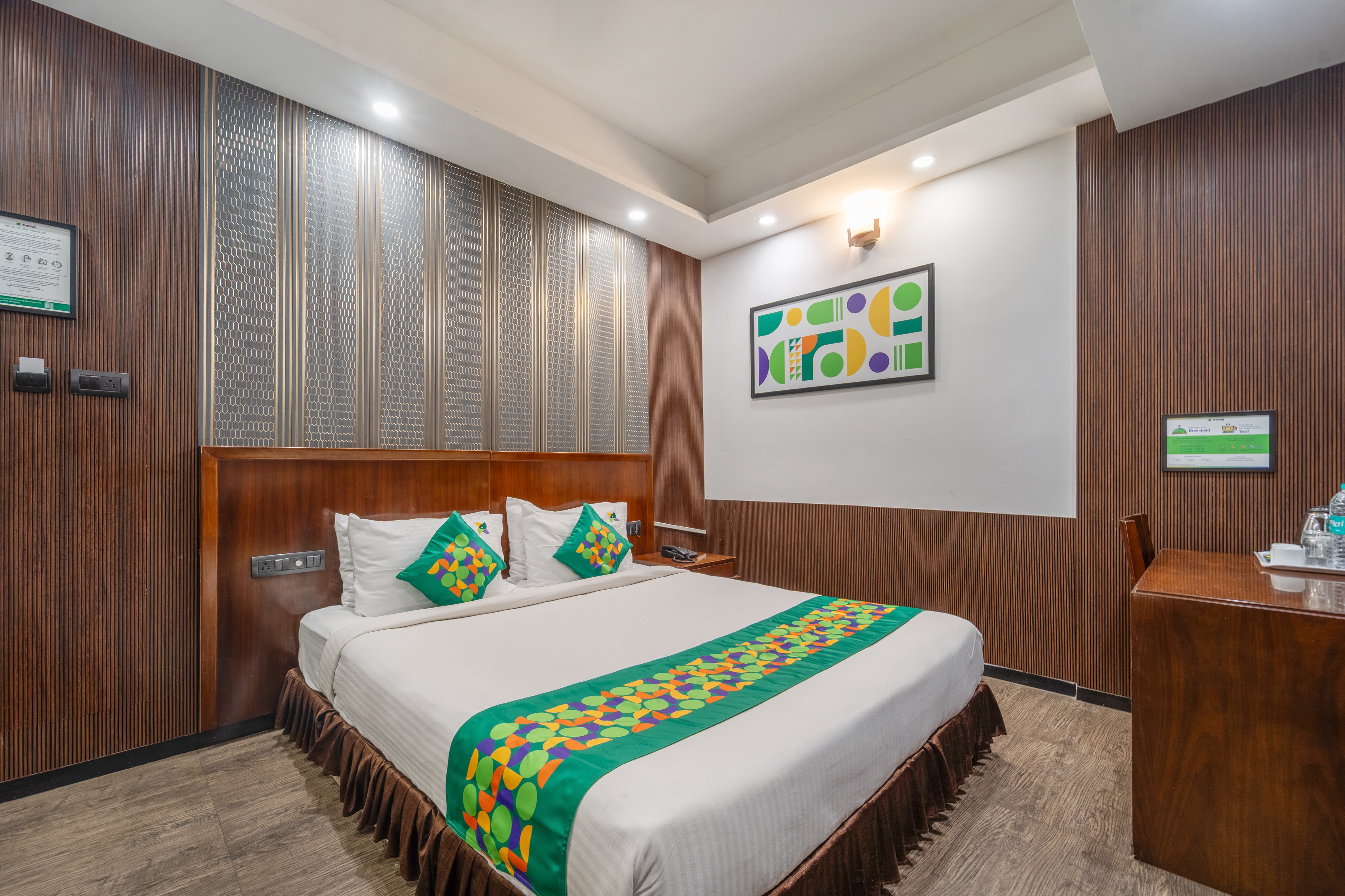 Deluxe room in Treebo Le Pebble Near Tiruppur Railway Station in undefined.