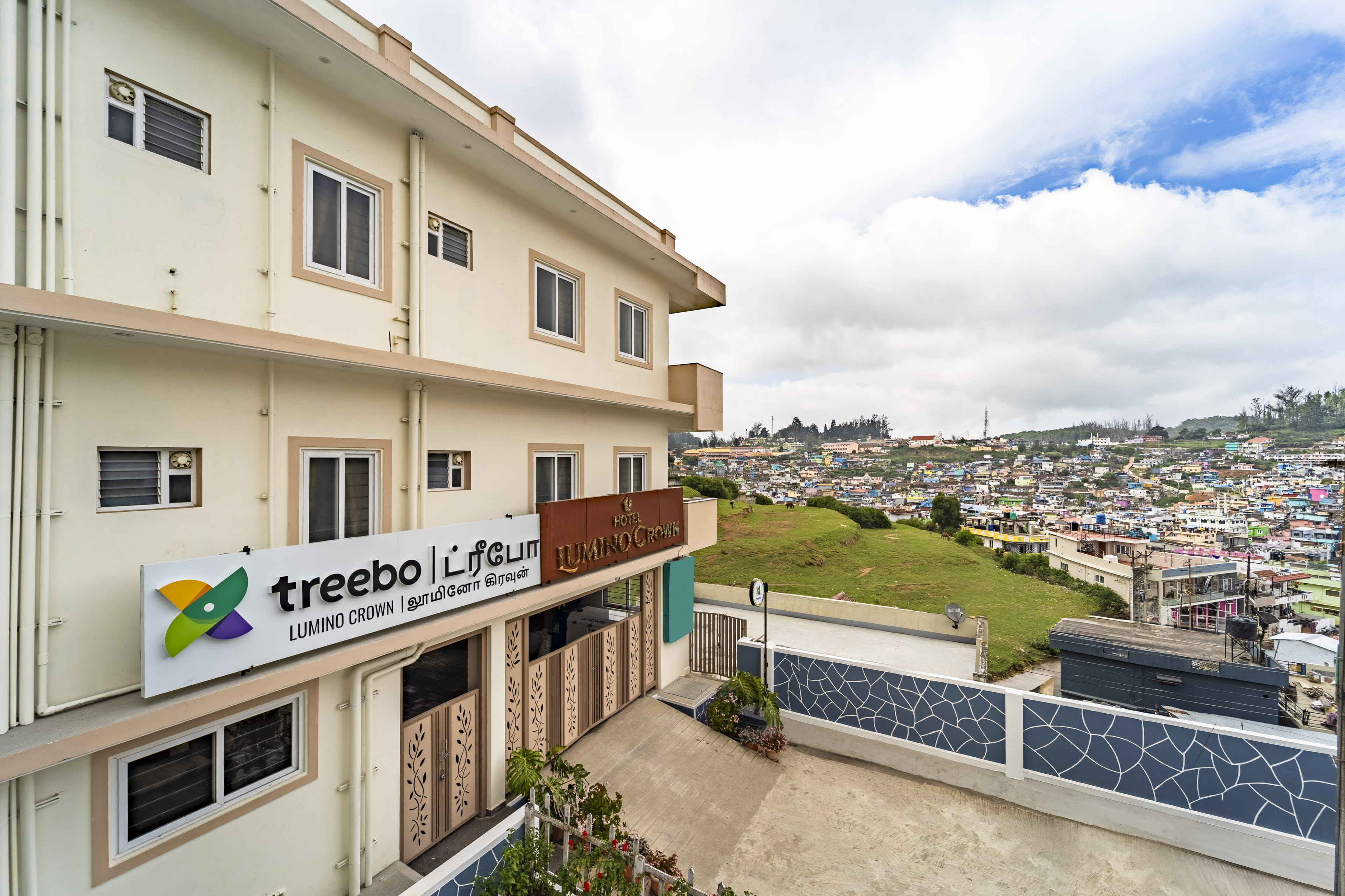The facade of Treebo Lumino Crown, 850 Meters From Ooty Lake in undefined. 