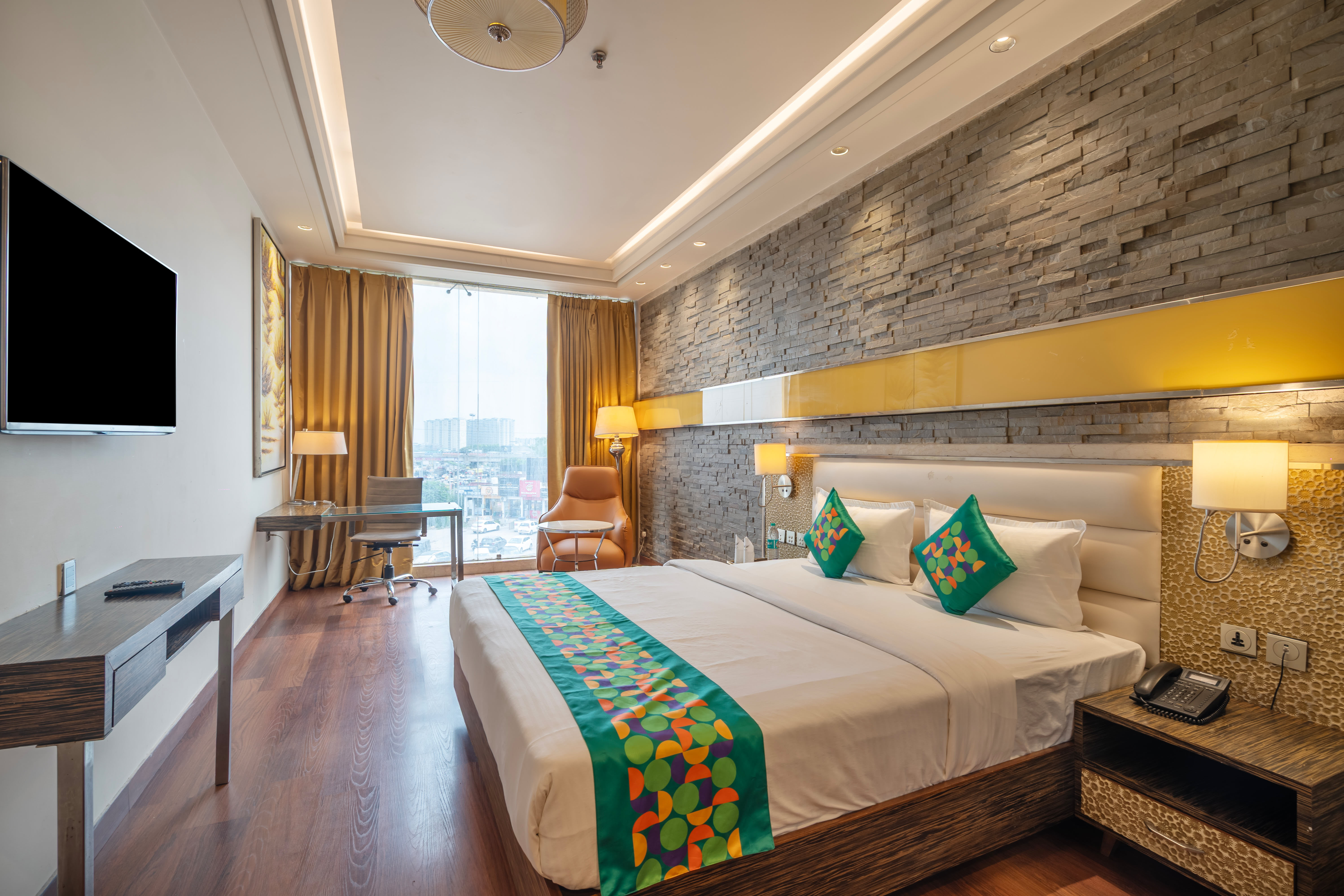 Deluxe room in Treebo Premium Arista in undefined. Deluxe