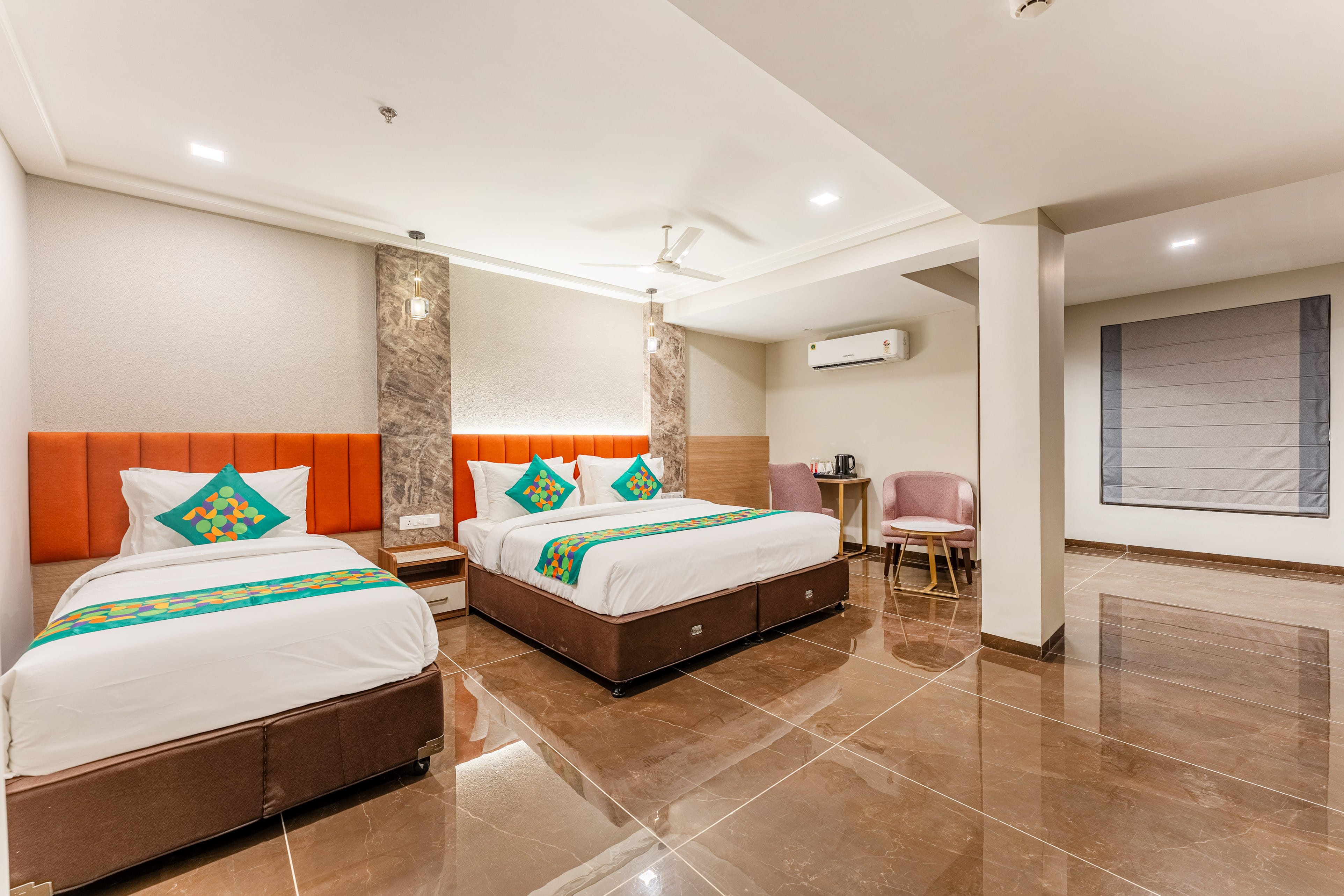 Deluxe room in Treebo Premium Nagpur Automotive Square in undefined. Spacious interiors with enhanced furnishings