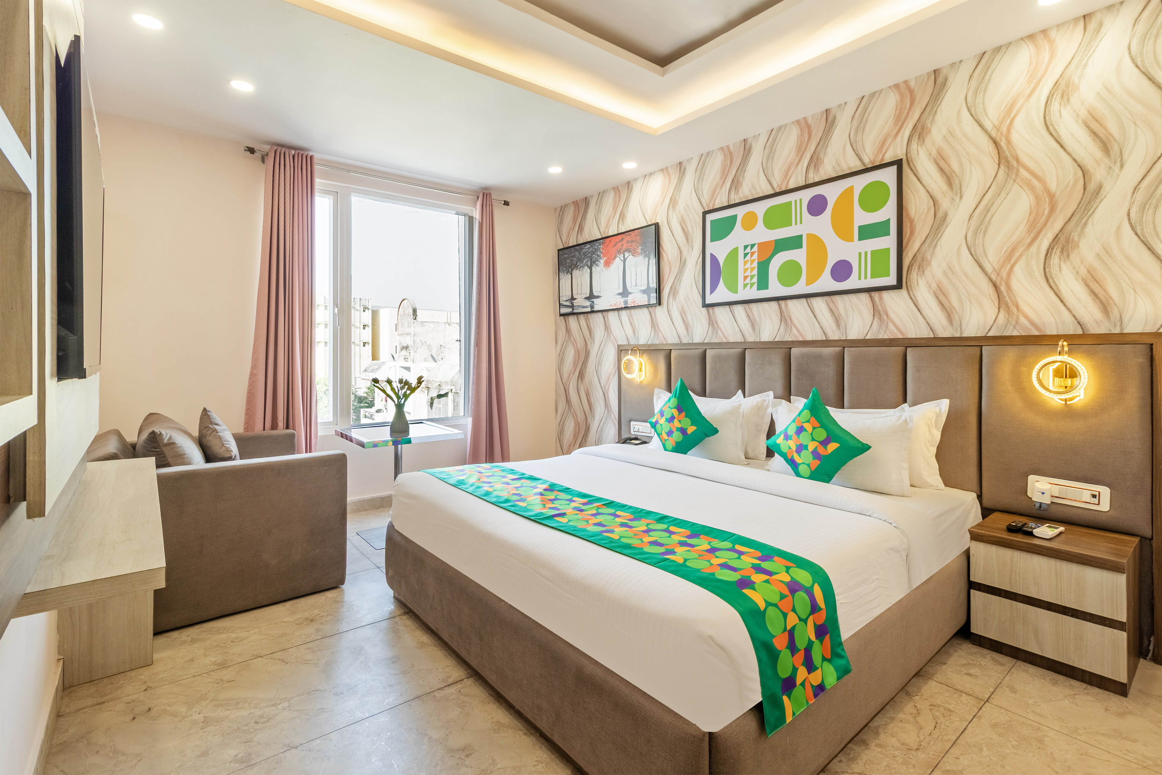 Deluxe room in Treebo Premium Paarth Grand with Rooftop Cafe in undefined. 