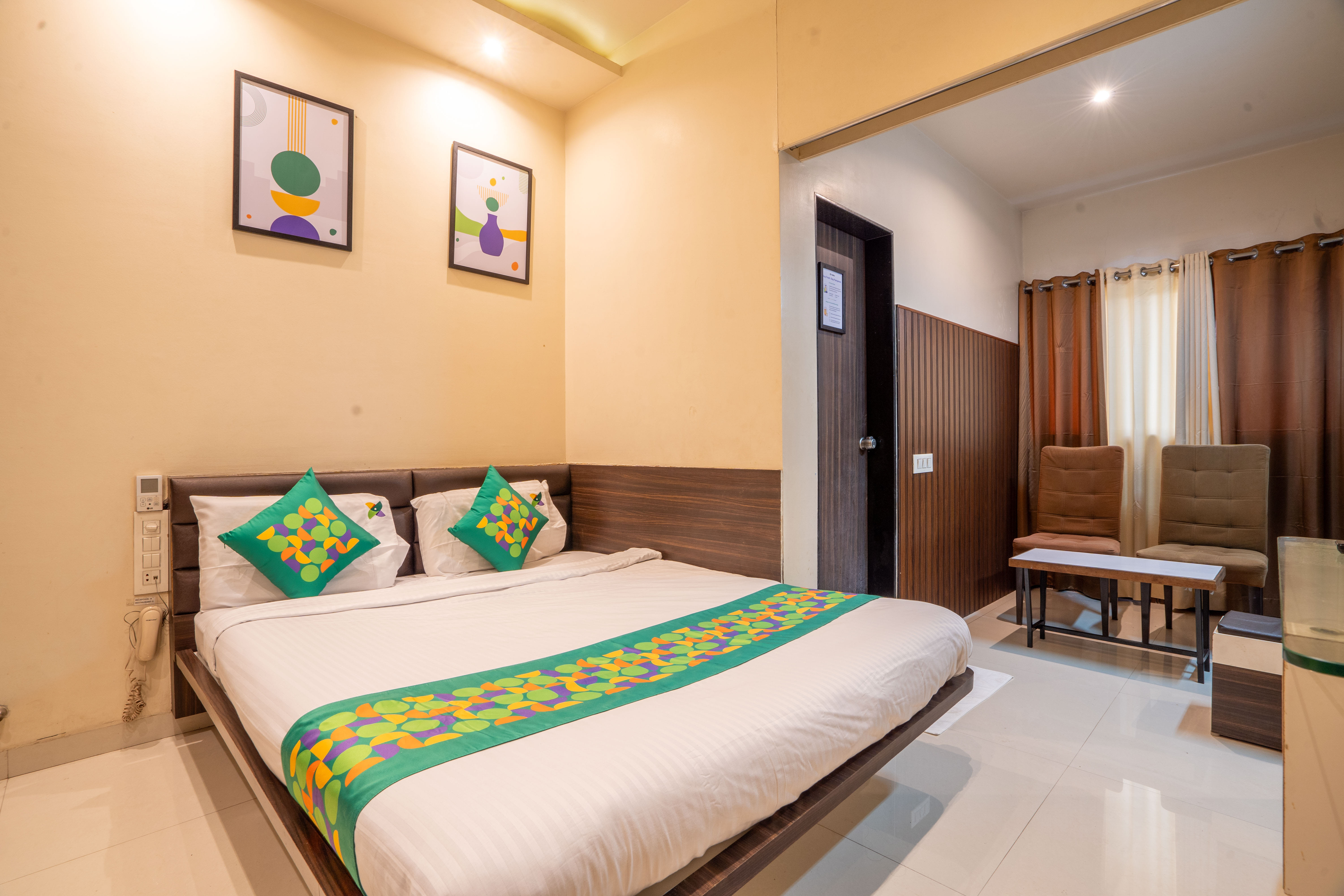 Standard room in Treebo Pushpak in undefined.