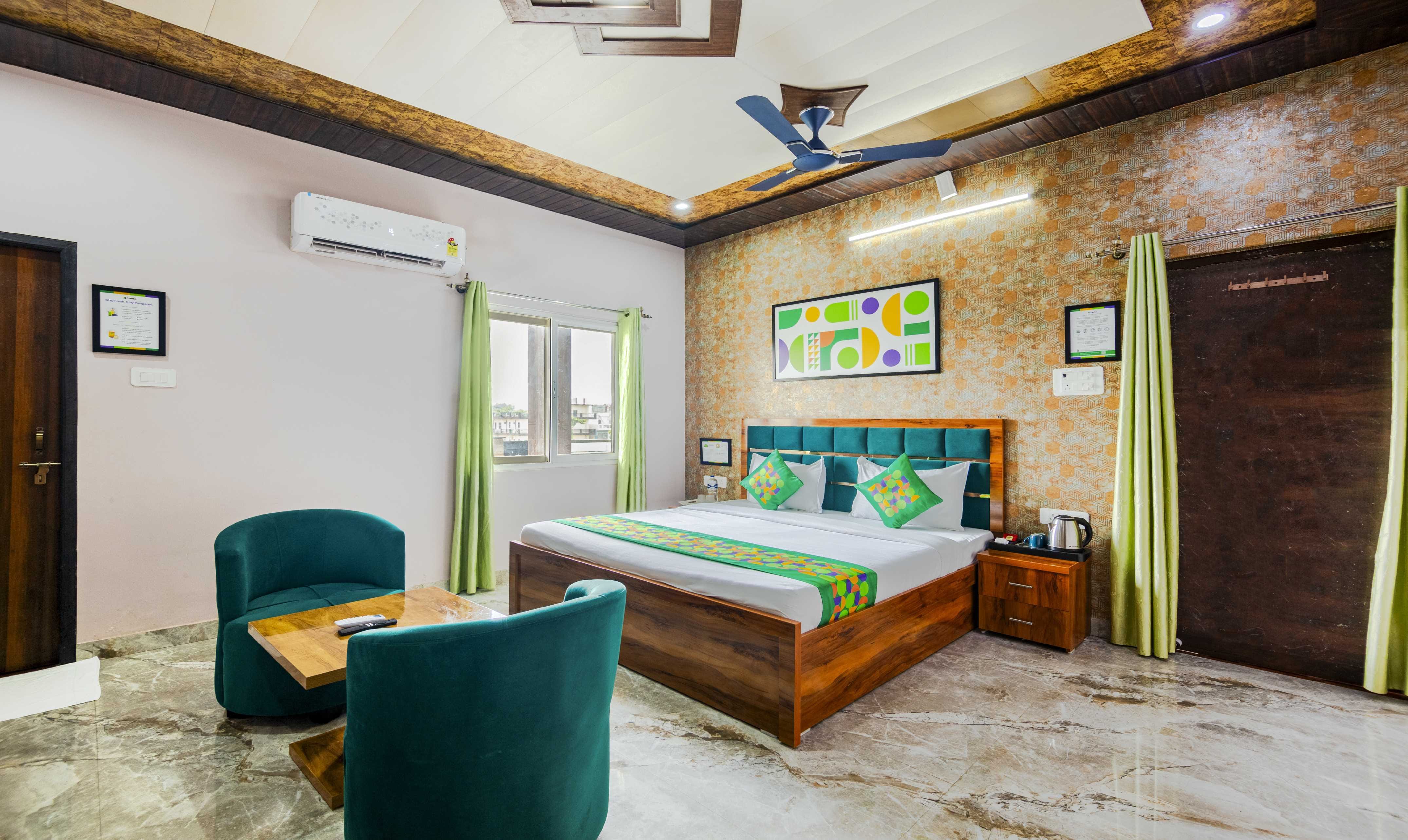 Deluxe room in Treebo Ramayan Suites Ayodhya in undefined. 