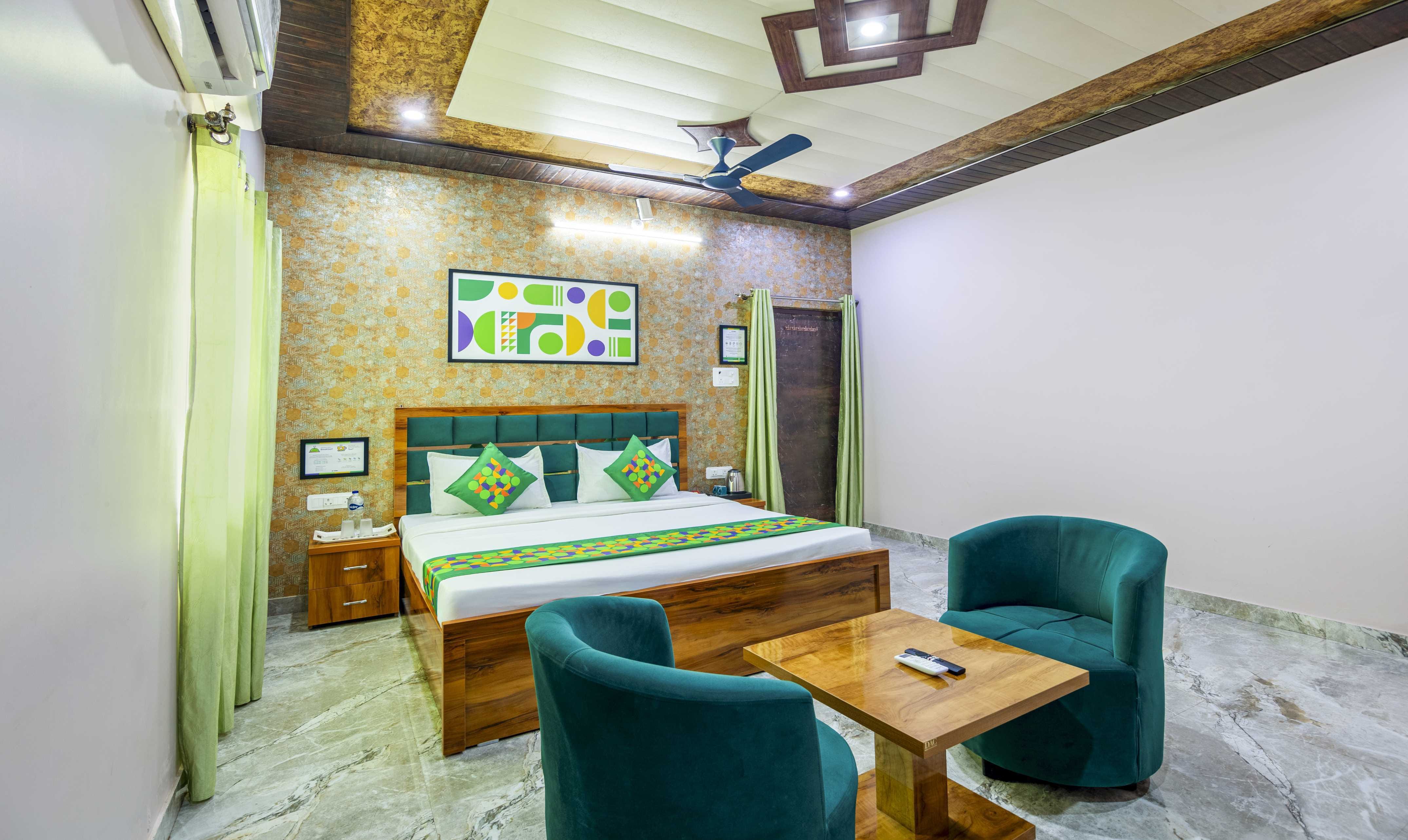 Deluxe room in Treebo Ramayan Suites Ayodhya in undefined. 