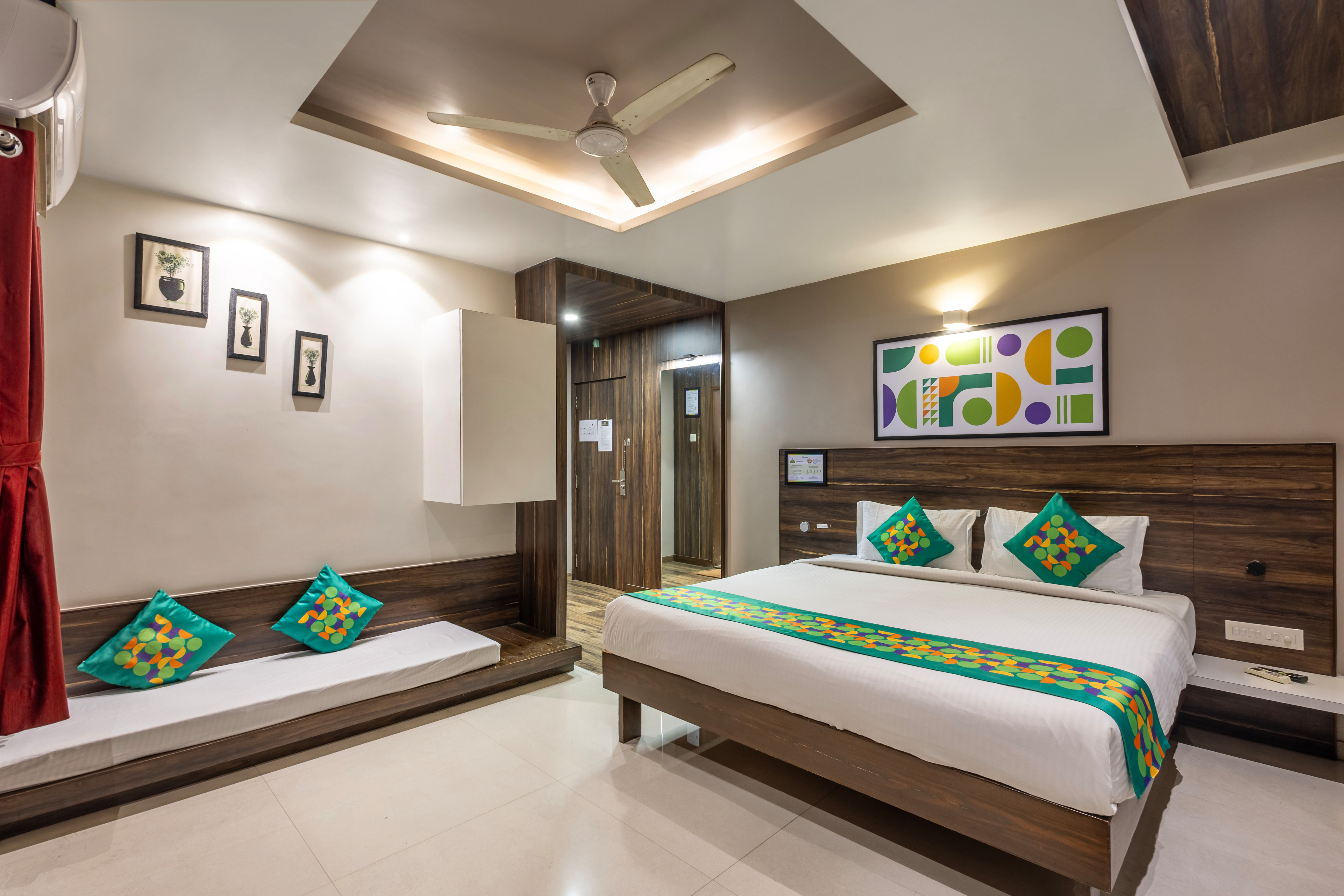 Standard room in Treebo Shree Sai Suites - 2km from Mahalaxmi Temple in undefined.
