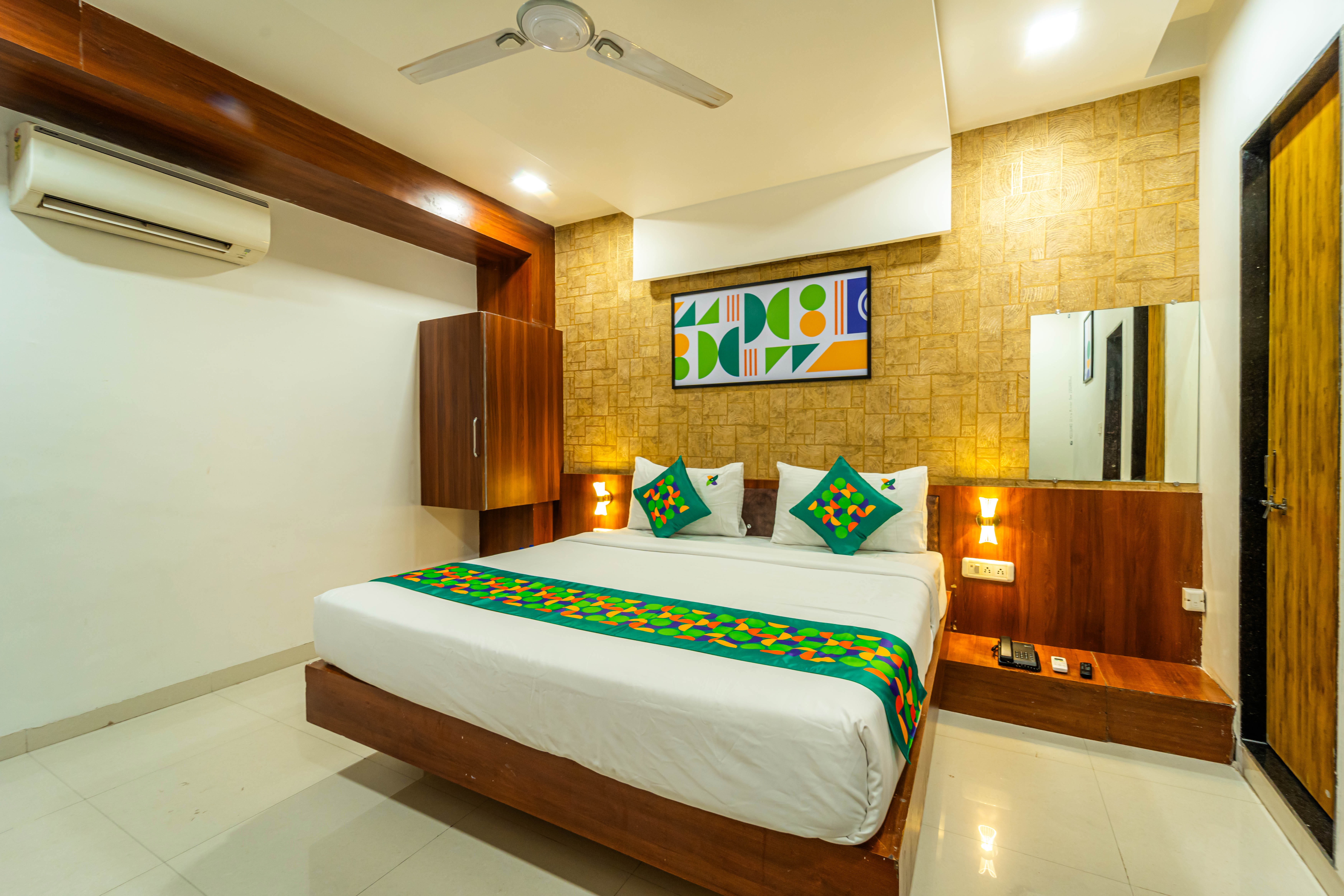 Deluxe room in Treebo Ten Eleven Grand, Scheme 78 in undefined. 