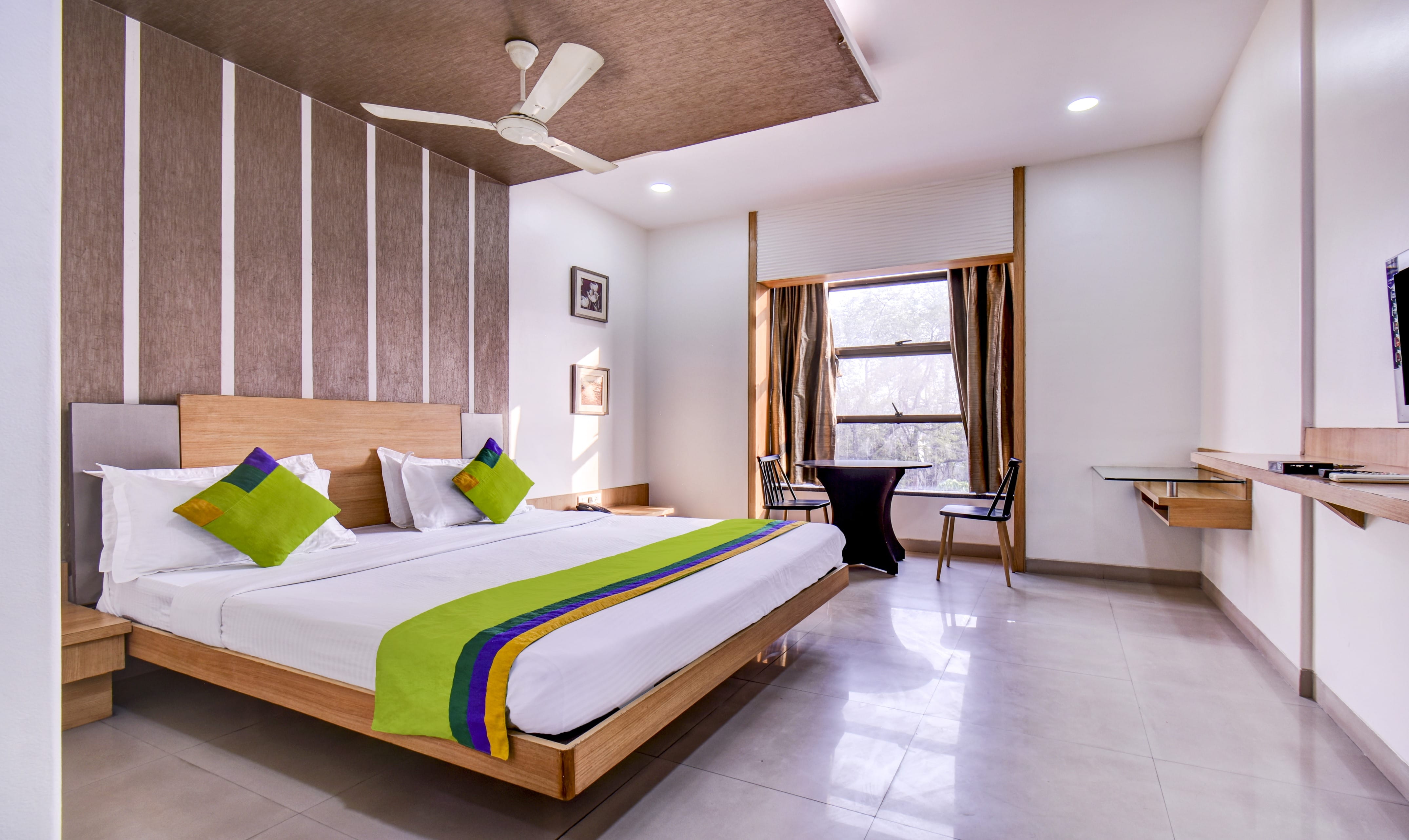 Deluxe room in Admiral Suites churned in undefined. Spacious and tastefully furnished