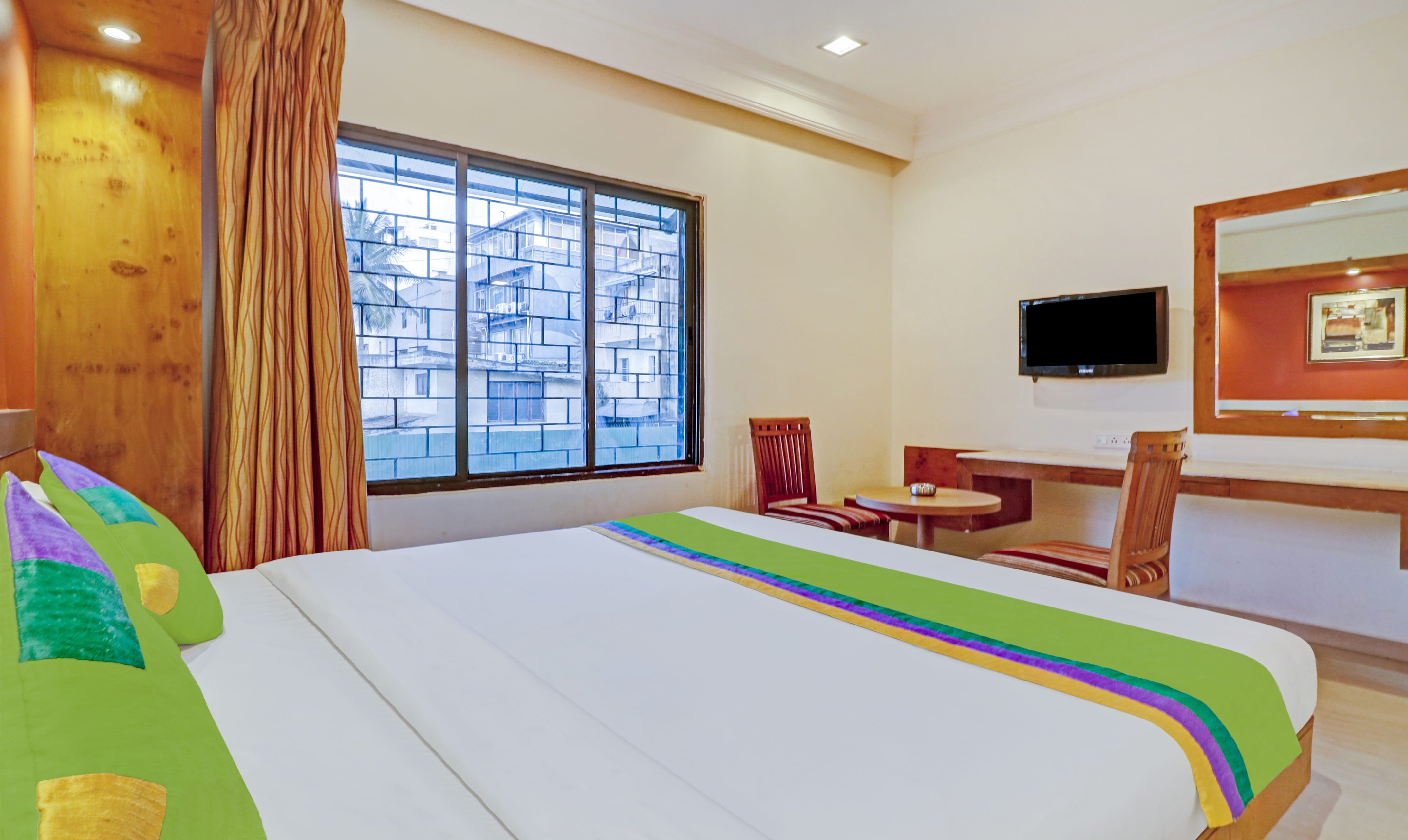 Standard room in Suraksha Inn Churned in undefined. Amenities aplenty