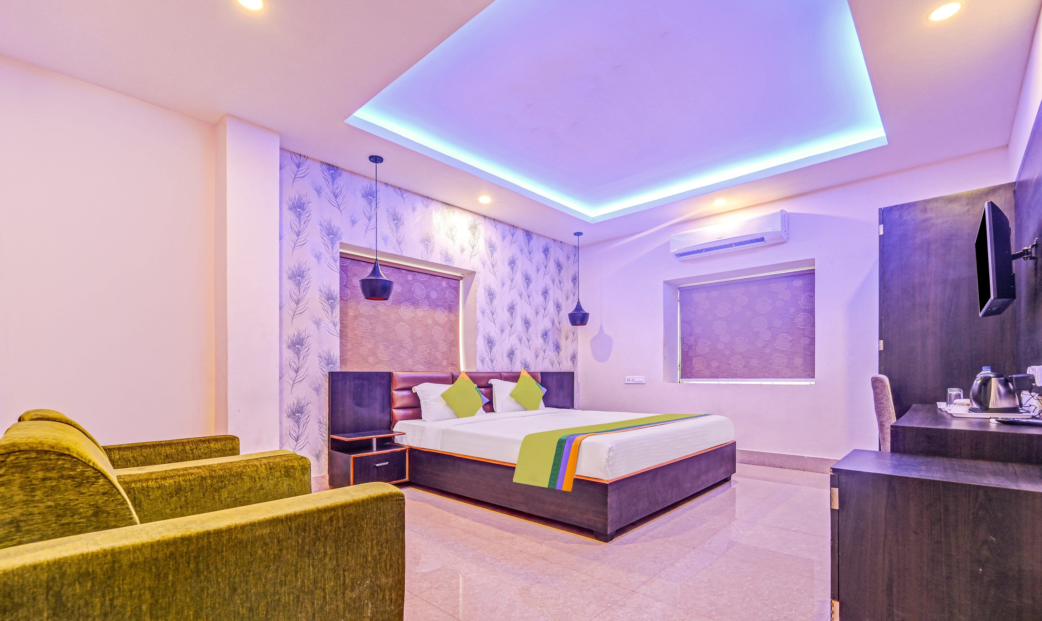 Deluxe room in Treebo The Bollywood in undefined. Spacious rooms with calm vibe