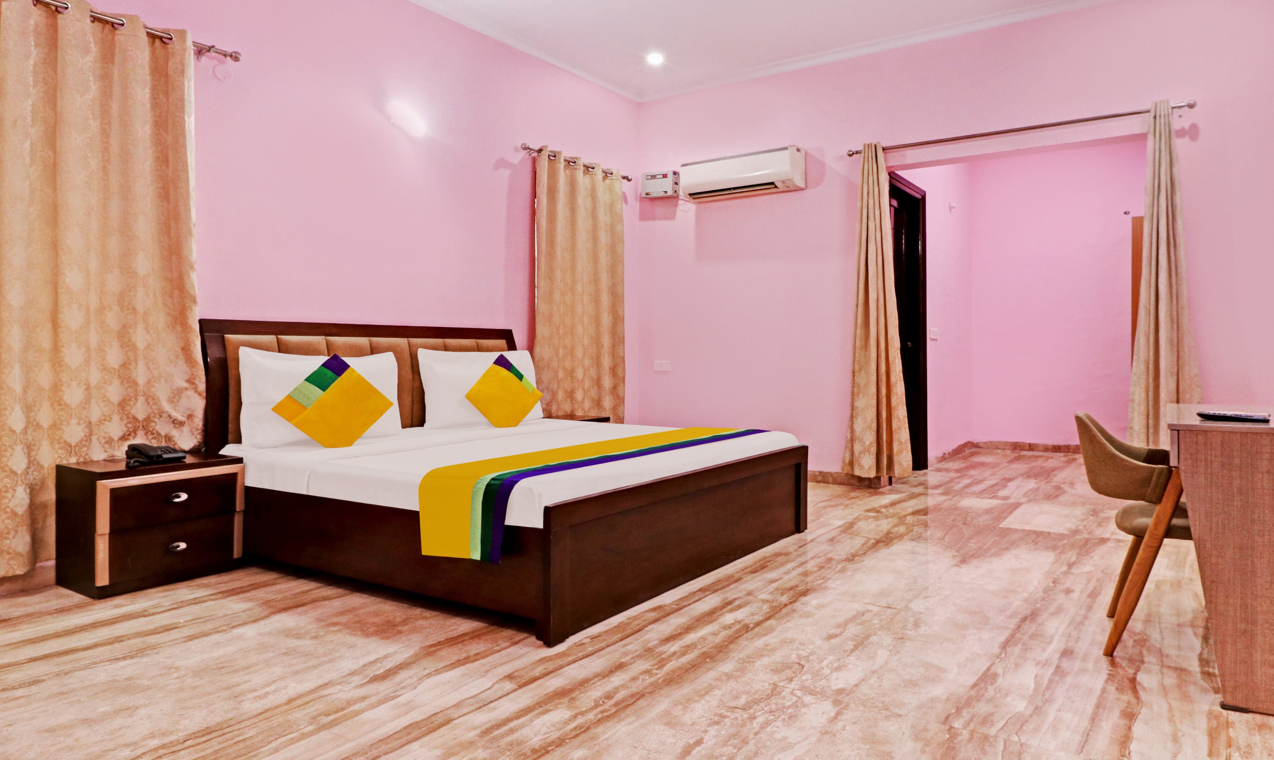 Deluxe room in Rainam Churned in undefined. Relaxing beds