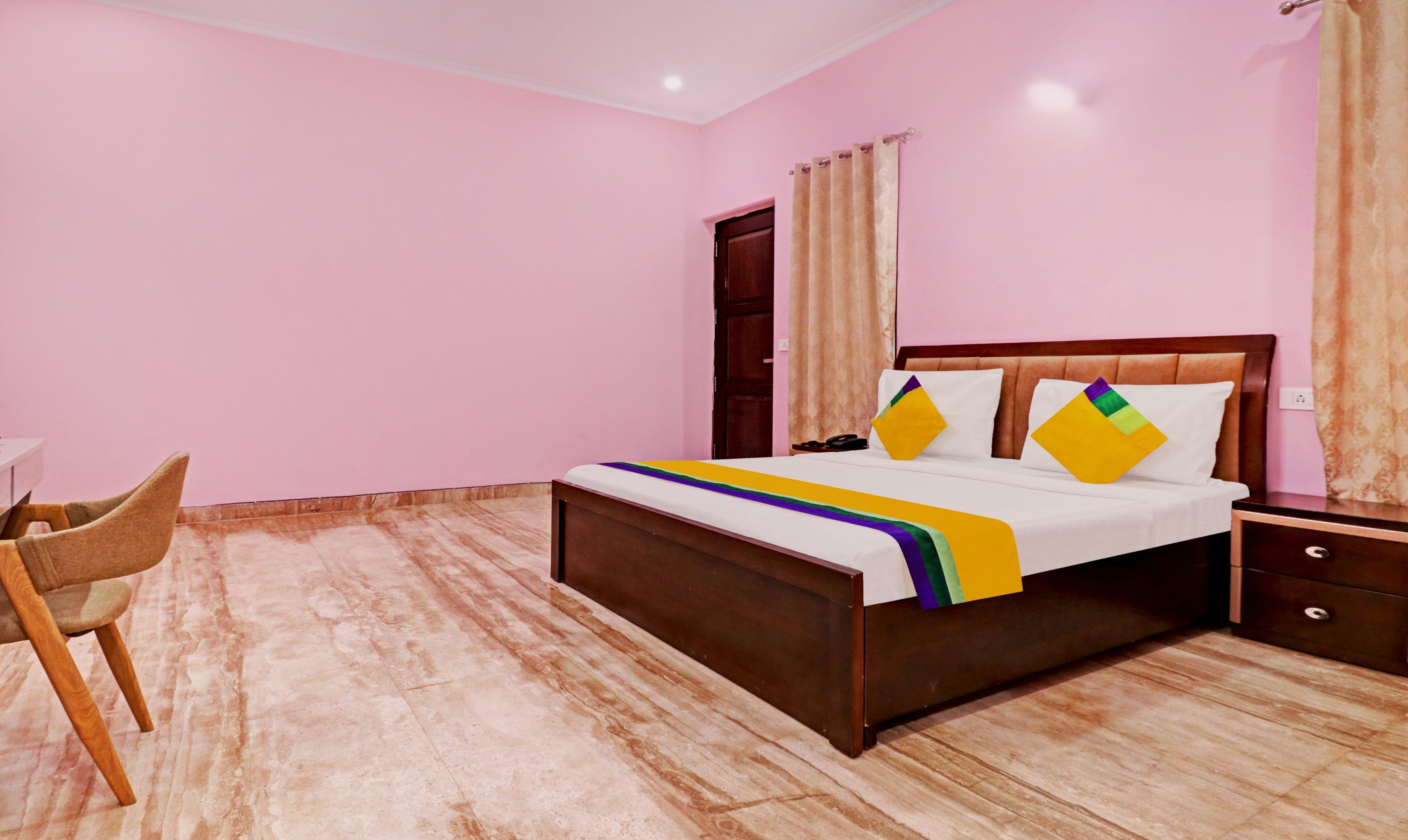 Deluxe room in Rainam Churned in undefined. Magnificently furnished