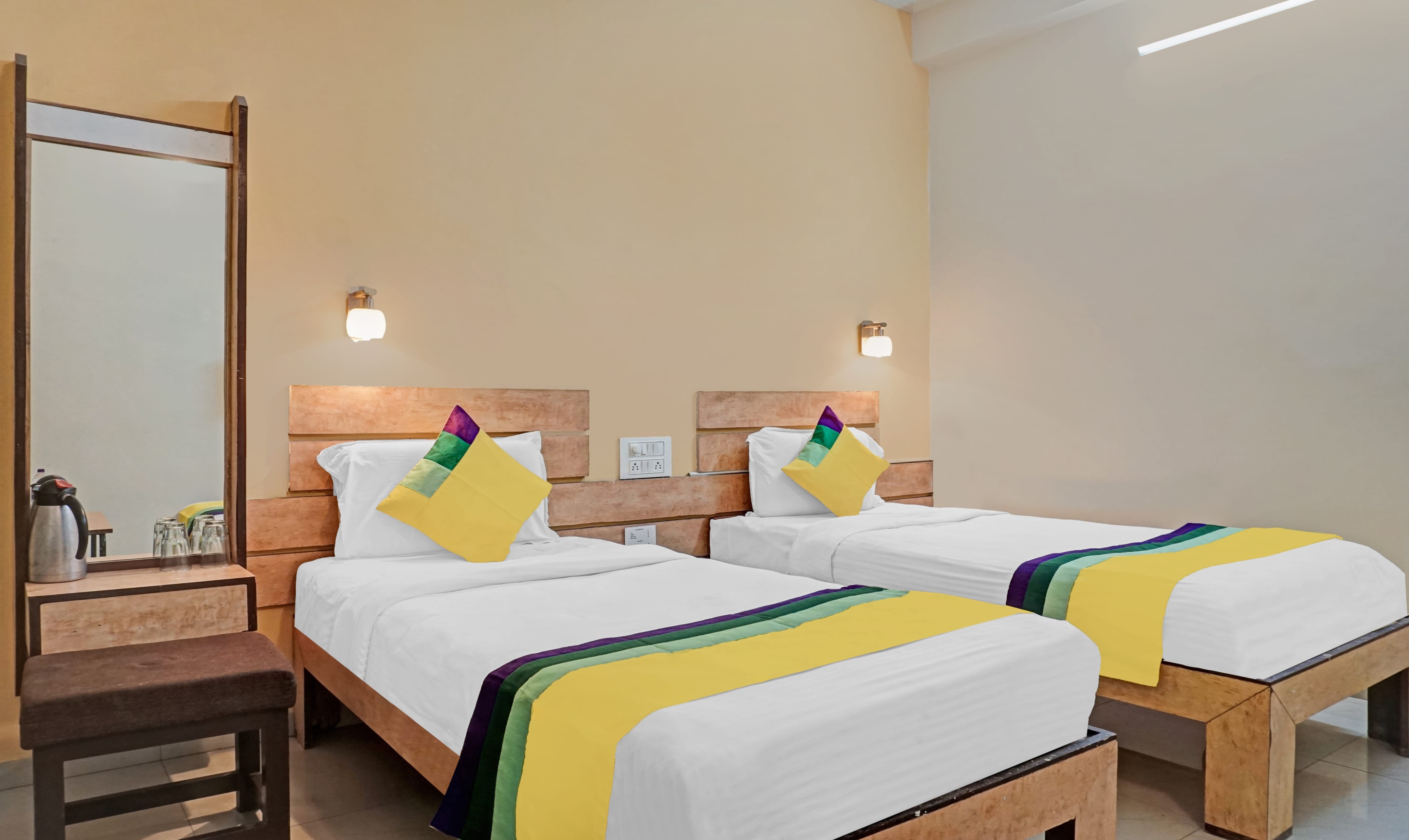 Deluxe room in Itsy Hotels Ranjeet in undefined. Gracefully decked