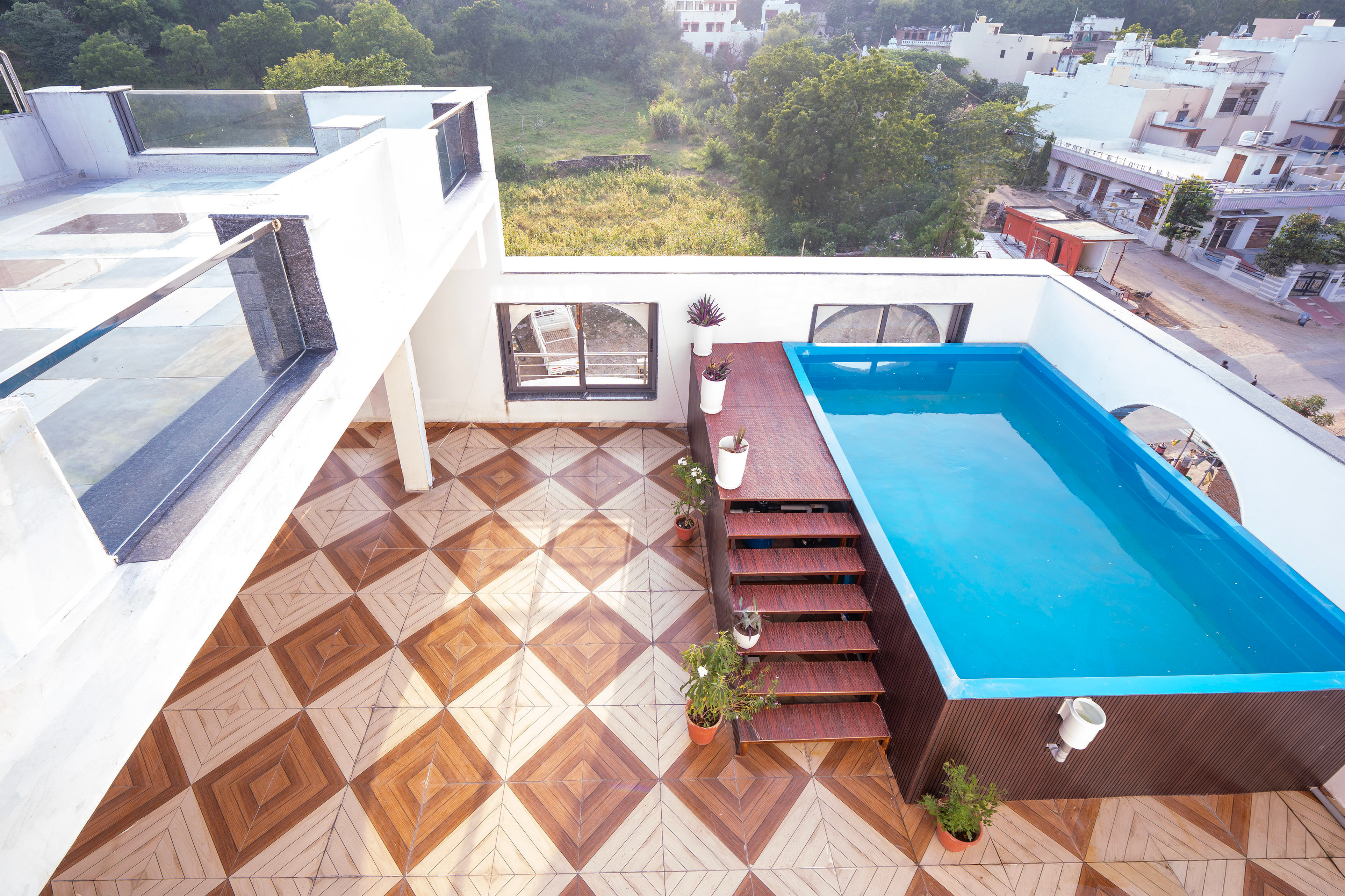 The Pool of Treebo Udai Shikhar with Swimming Pool in undefined. 